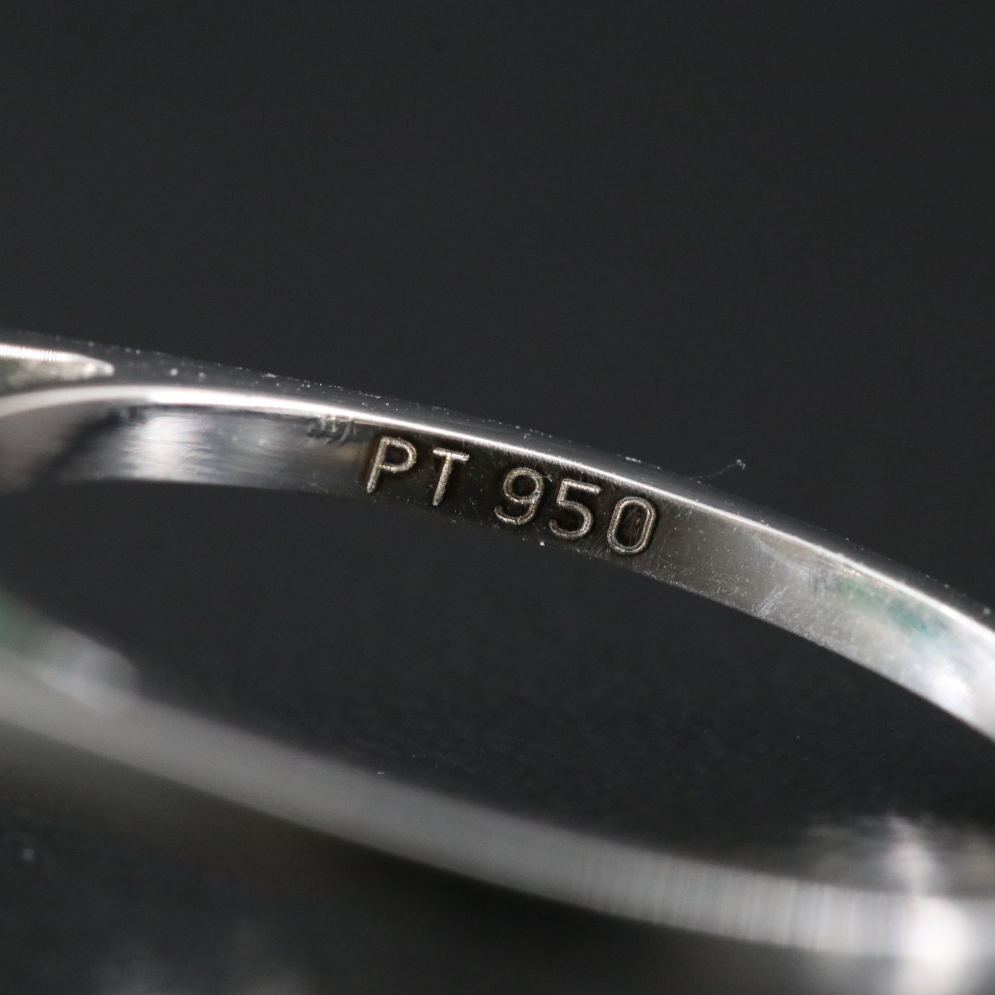 Platinum 7.96 CT Emerald and 0.20 CTW Diamond Ring