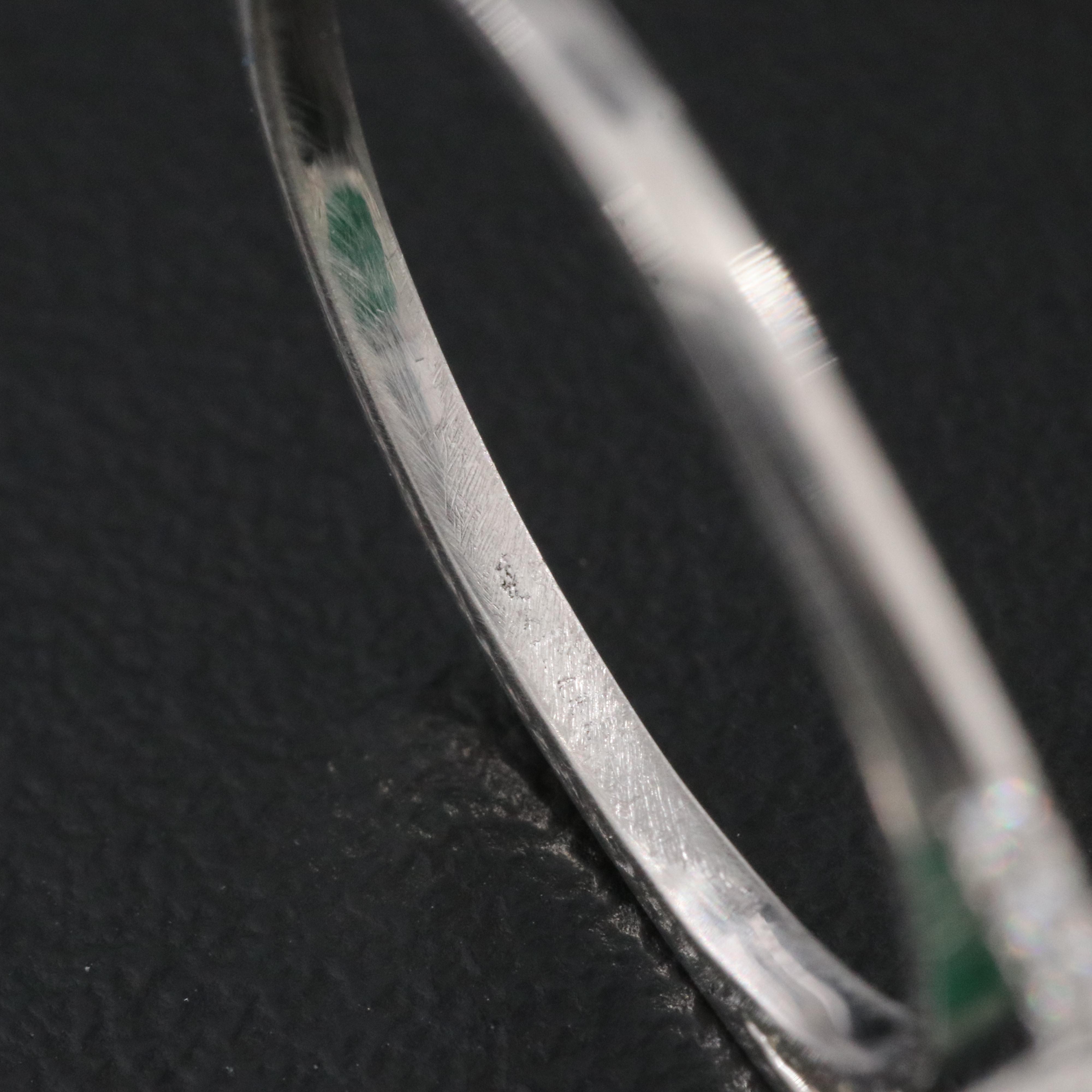 Platinum 7.85 CT Emerald and 0.20 CTW Diamond Ring