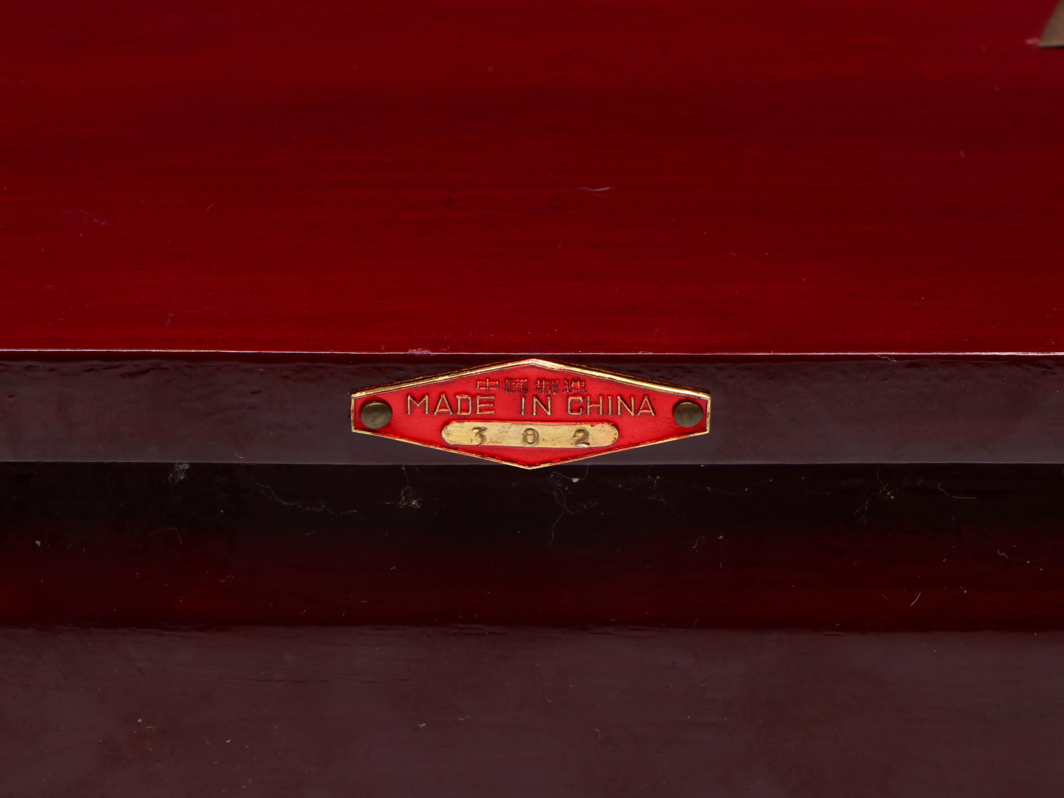 Chinese Lacquerware Jewelry Box Adorned with Carved Serpentine Medallion