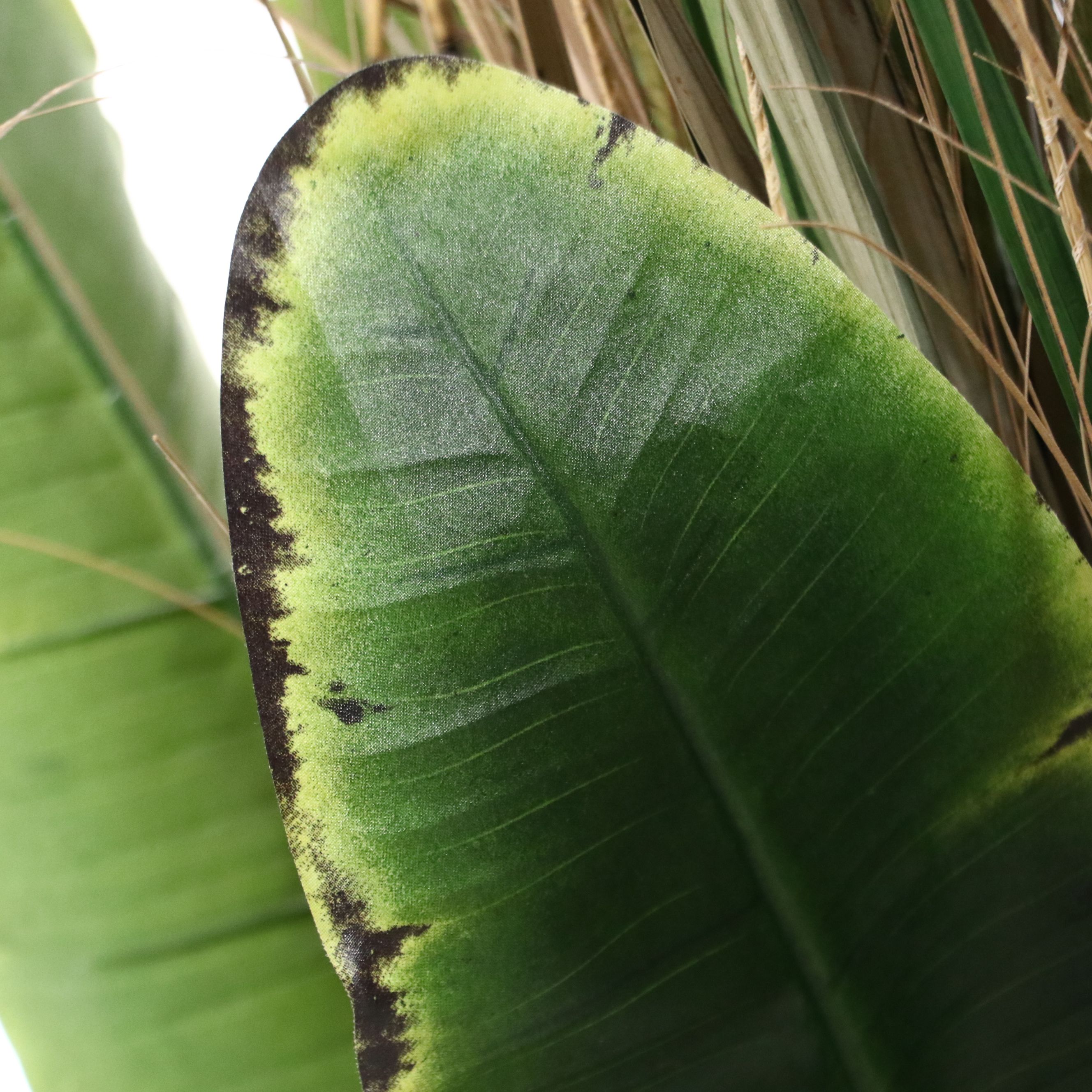 Artificial Sunflowers and Greenery in Ceramic Vase