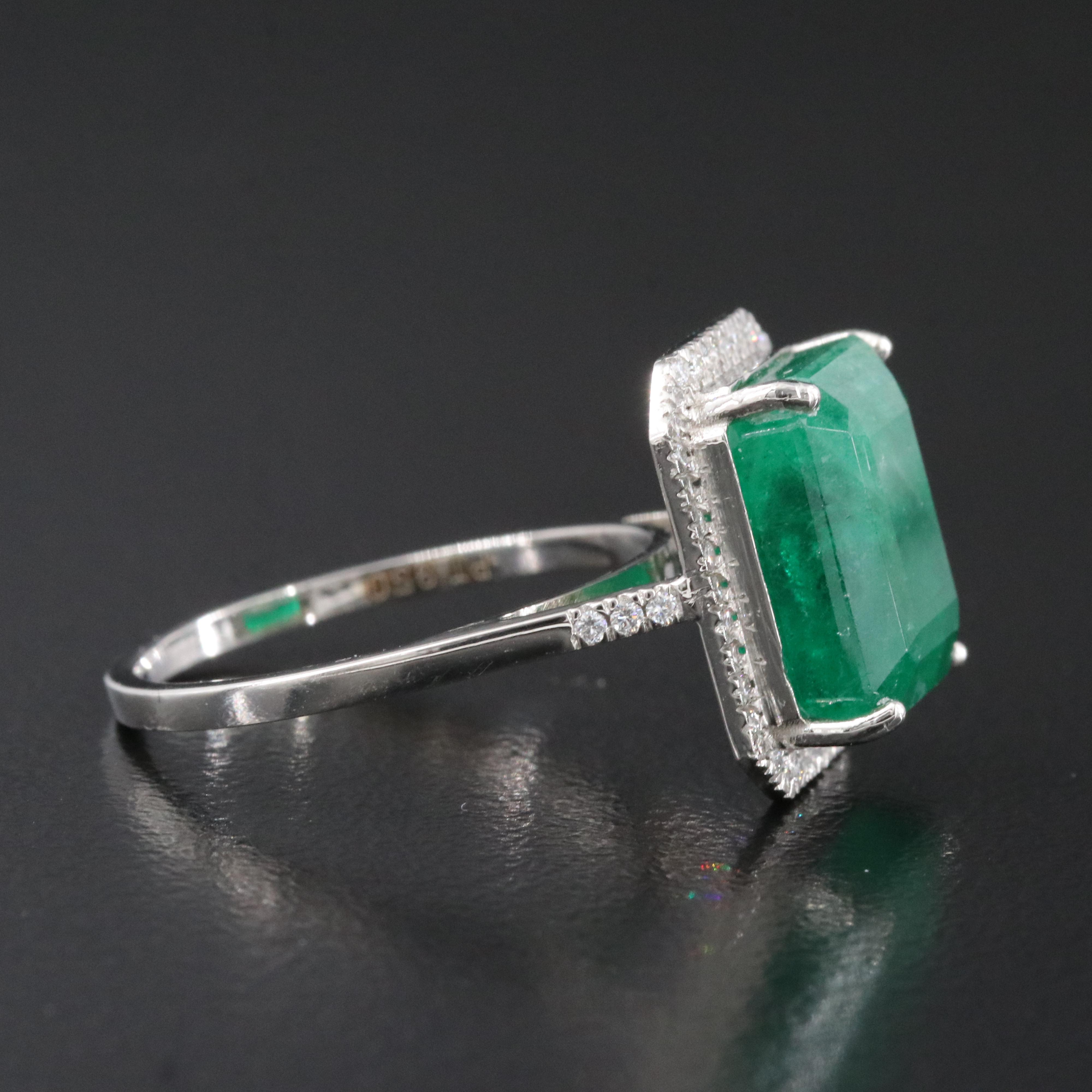 Platinum 7.10 CTW Emerald and 0.20 CTW Diamond Ring