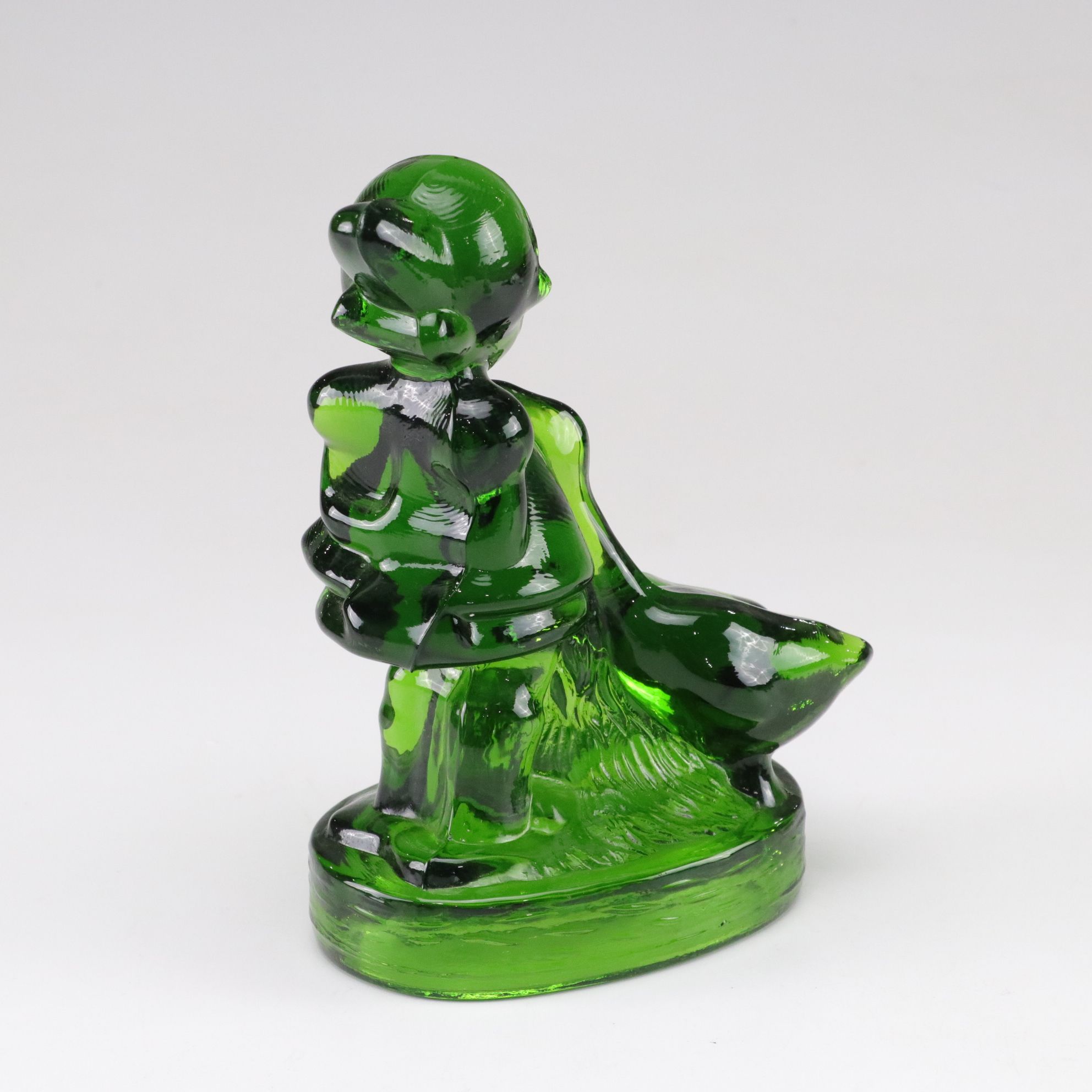 Emerald L.E. Smith Glass Hummel "Goose Girl" With Other Glass Figurines