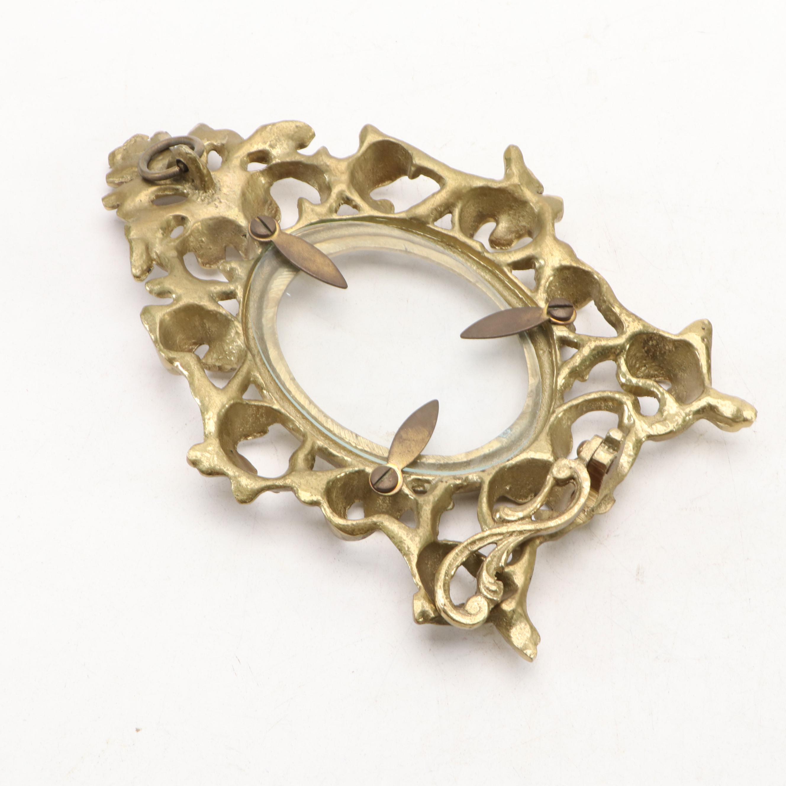 Giltmetal Baroque Oval and Africa Trading Square Easel Frames