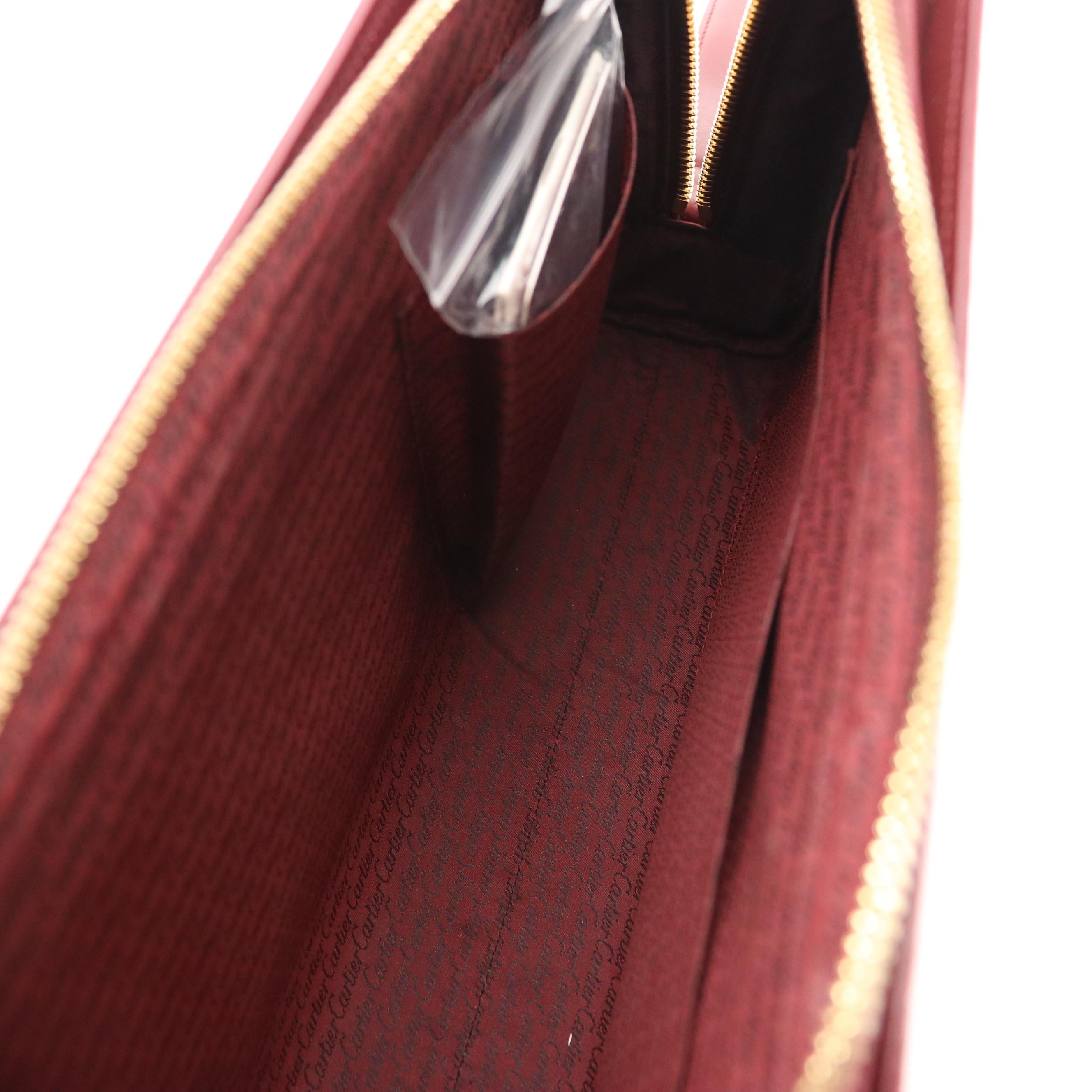 Cartier Wristlet Clutch in Burgundy Leather