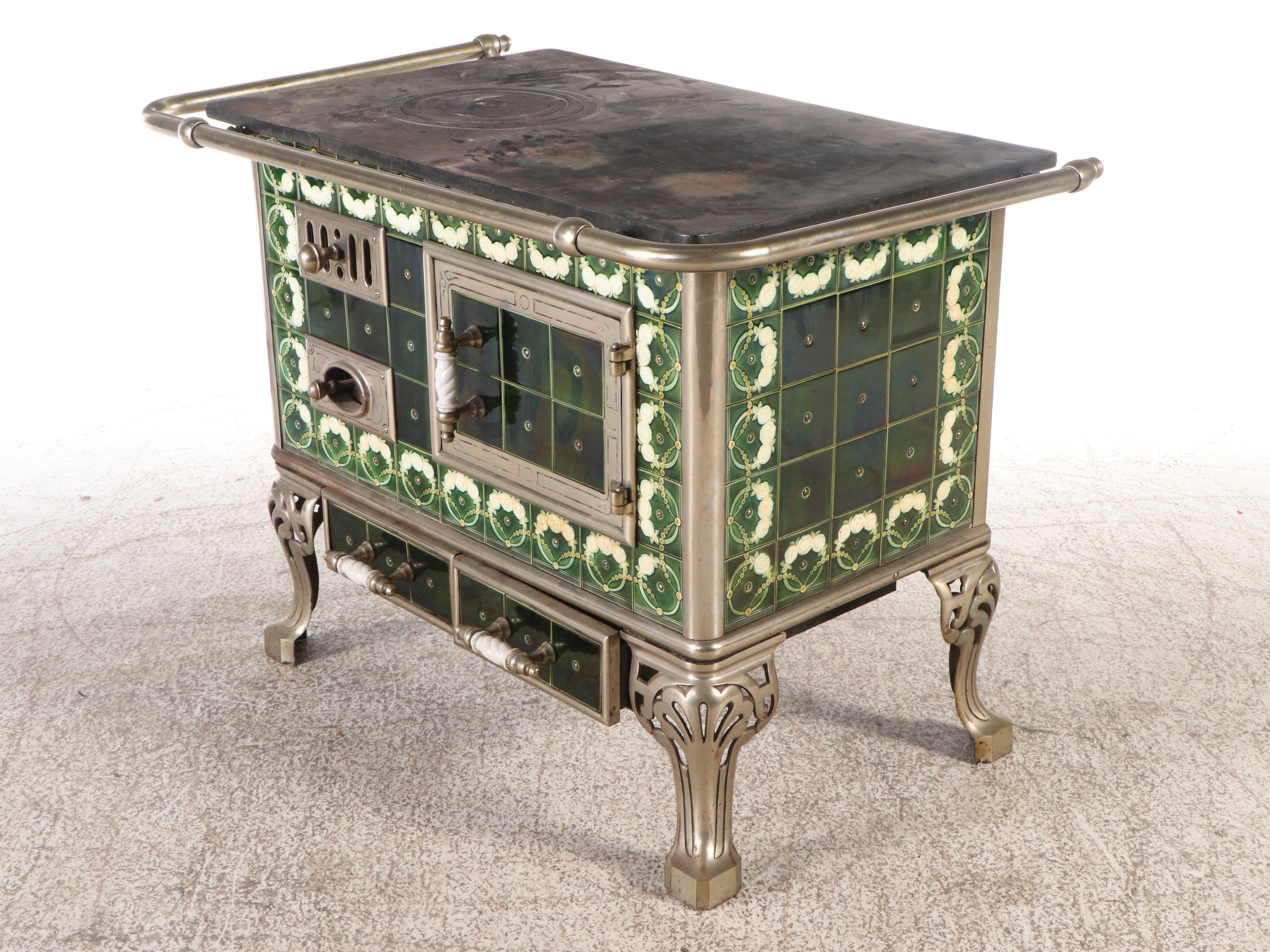 Antique Cast Iron Stove with Green Tile Trim and Matching Coal Scuttle