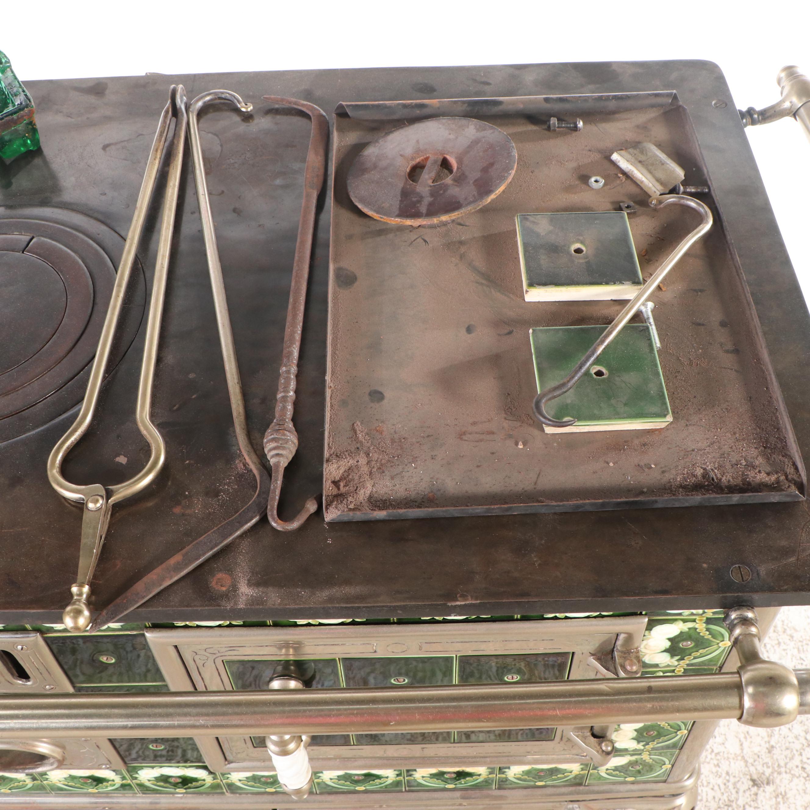 Antique Cast Iron Stove with Green Tile Trim and Matching Coal Scuttle