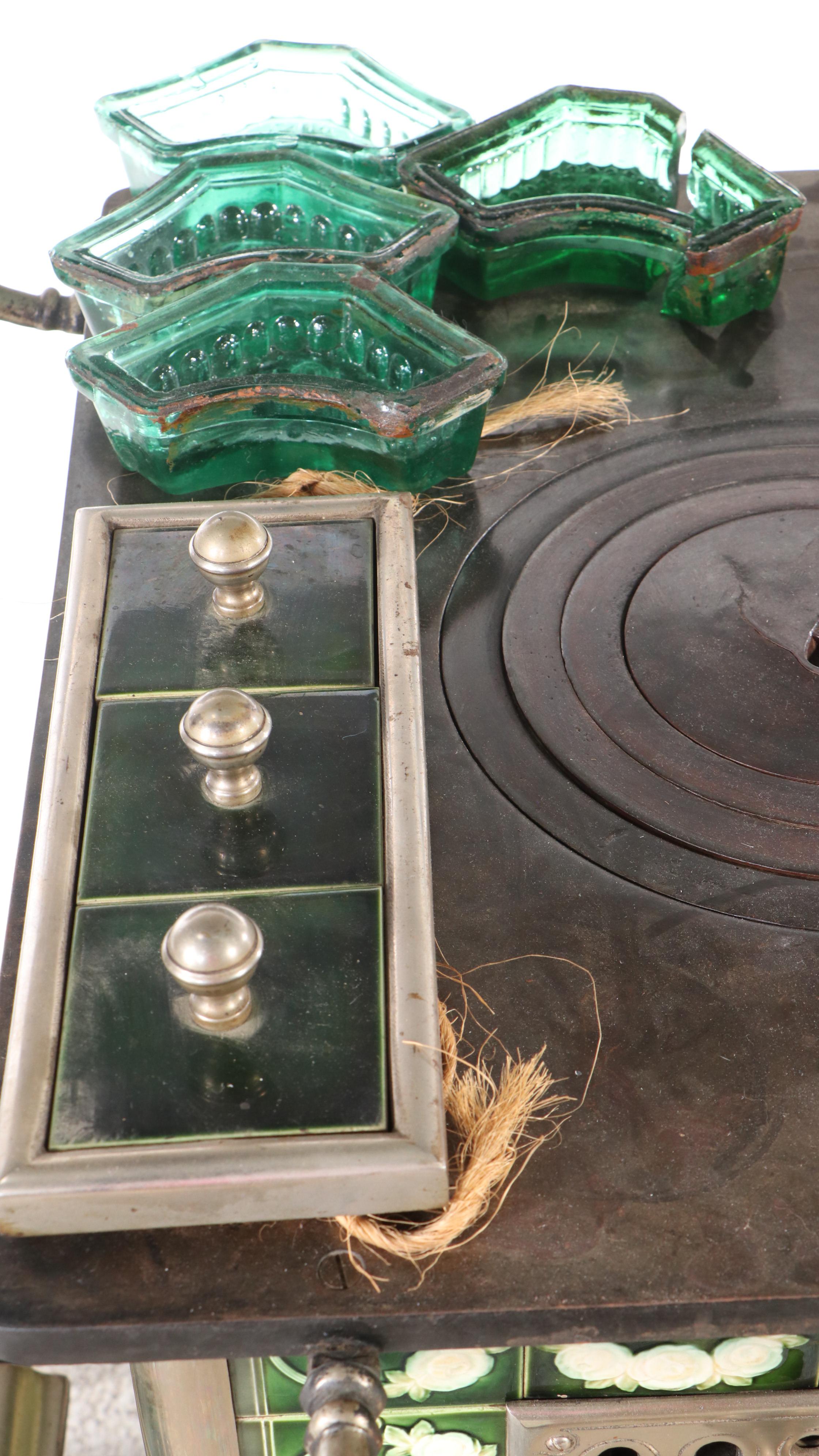 Antique Cast Iron Stove with Green Tile Trim and Matching Coal Scuttle