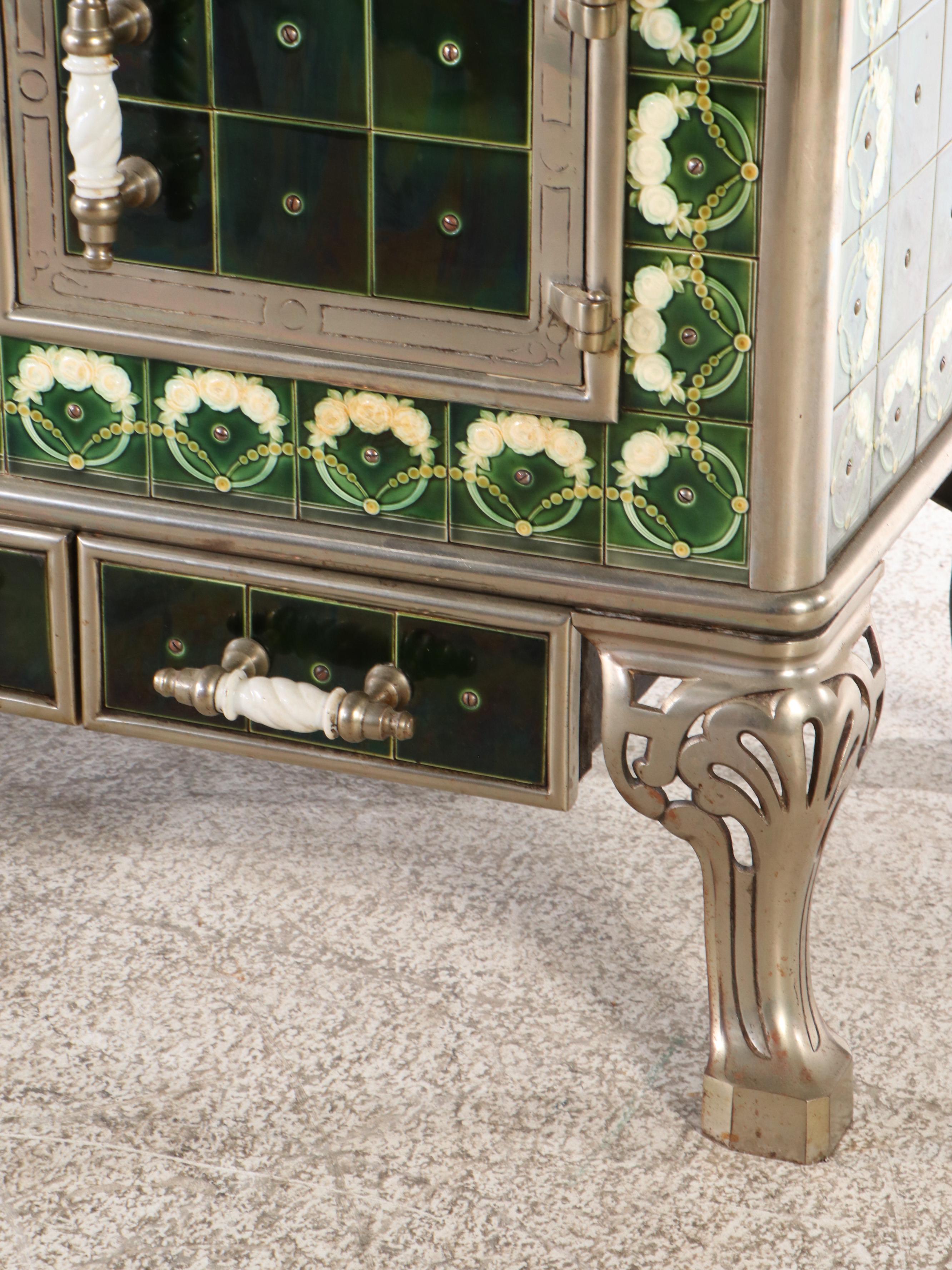 Antique Cast Iron Stove with Green Tile Trim and Matching Coal Scuttle