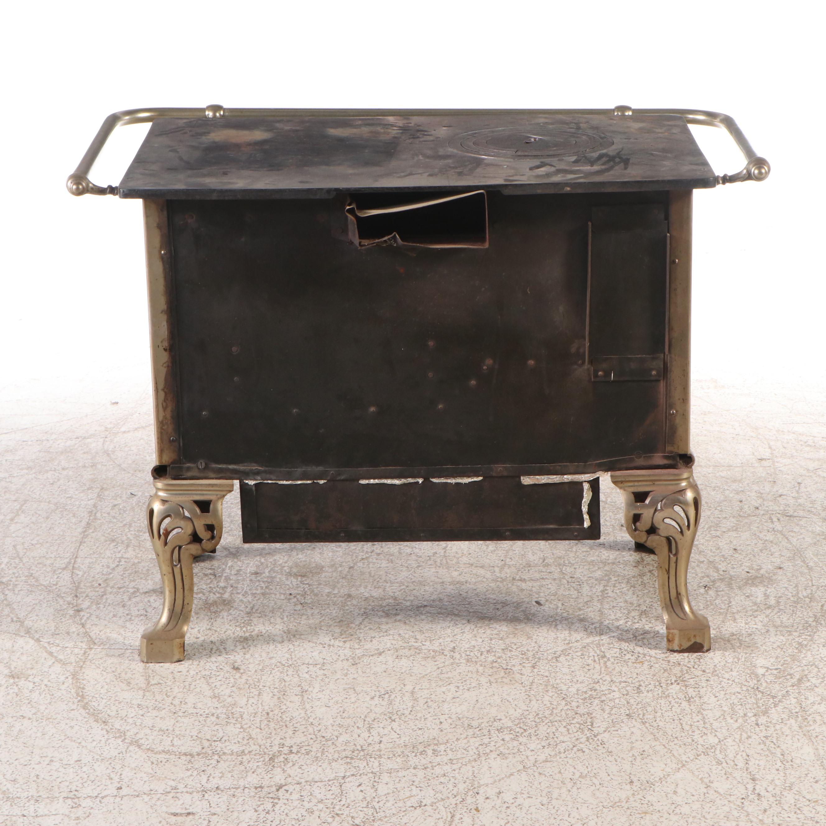 Antique Cast Iron Stove with Green Tile Trim and Matching Coal Scuttle