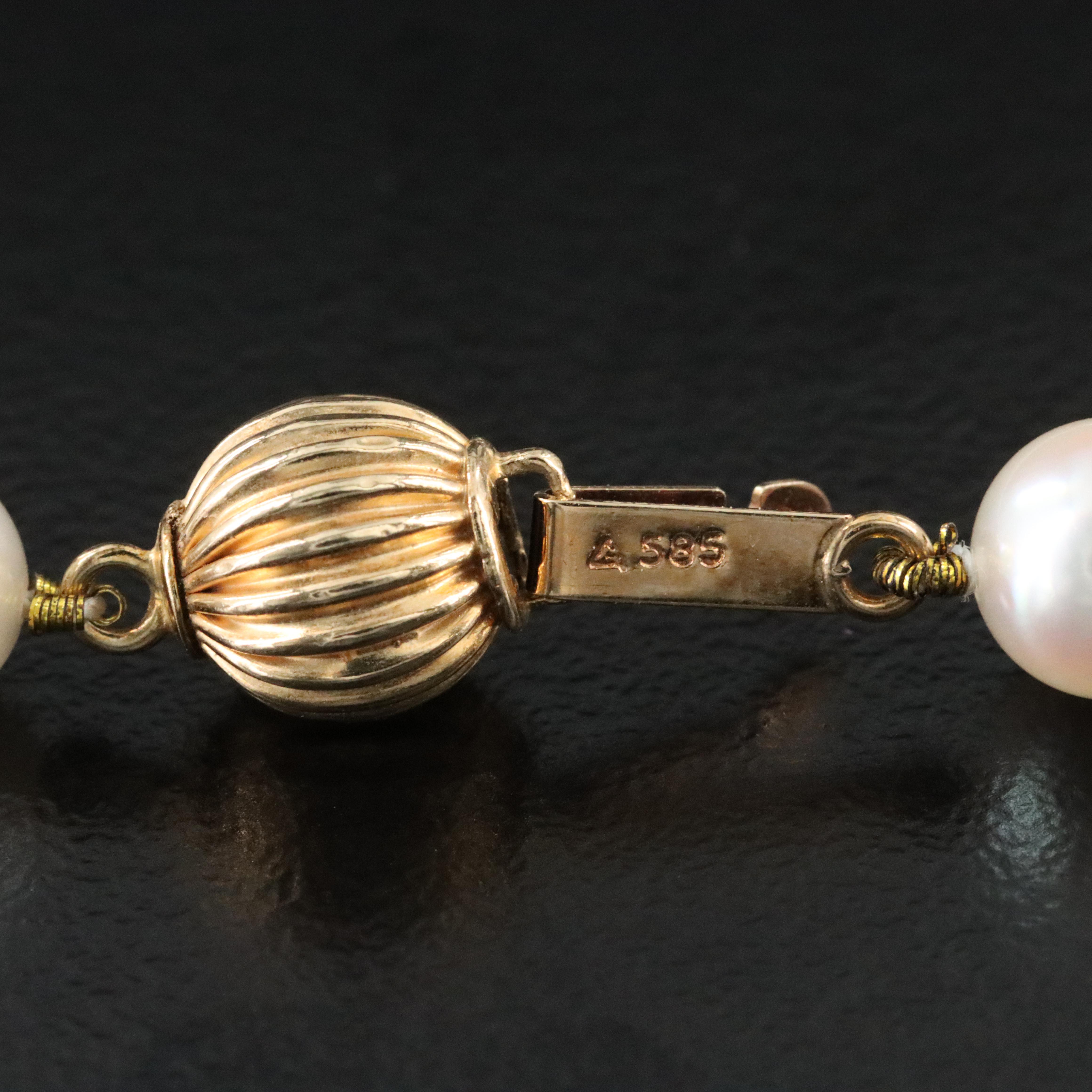 Pearl Necklace with 14K Clasp and Topaz and Diamond Enhancer Pendant