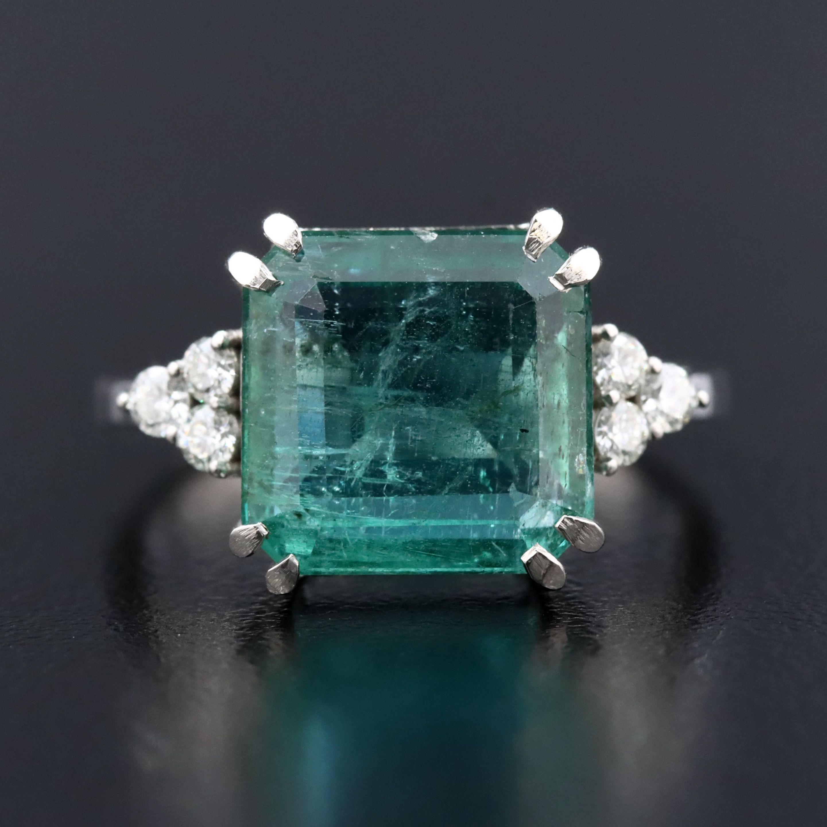 Platinum 5.50 CT Emerald and 0.18 CTW Diamond Ring