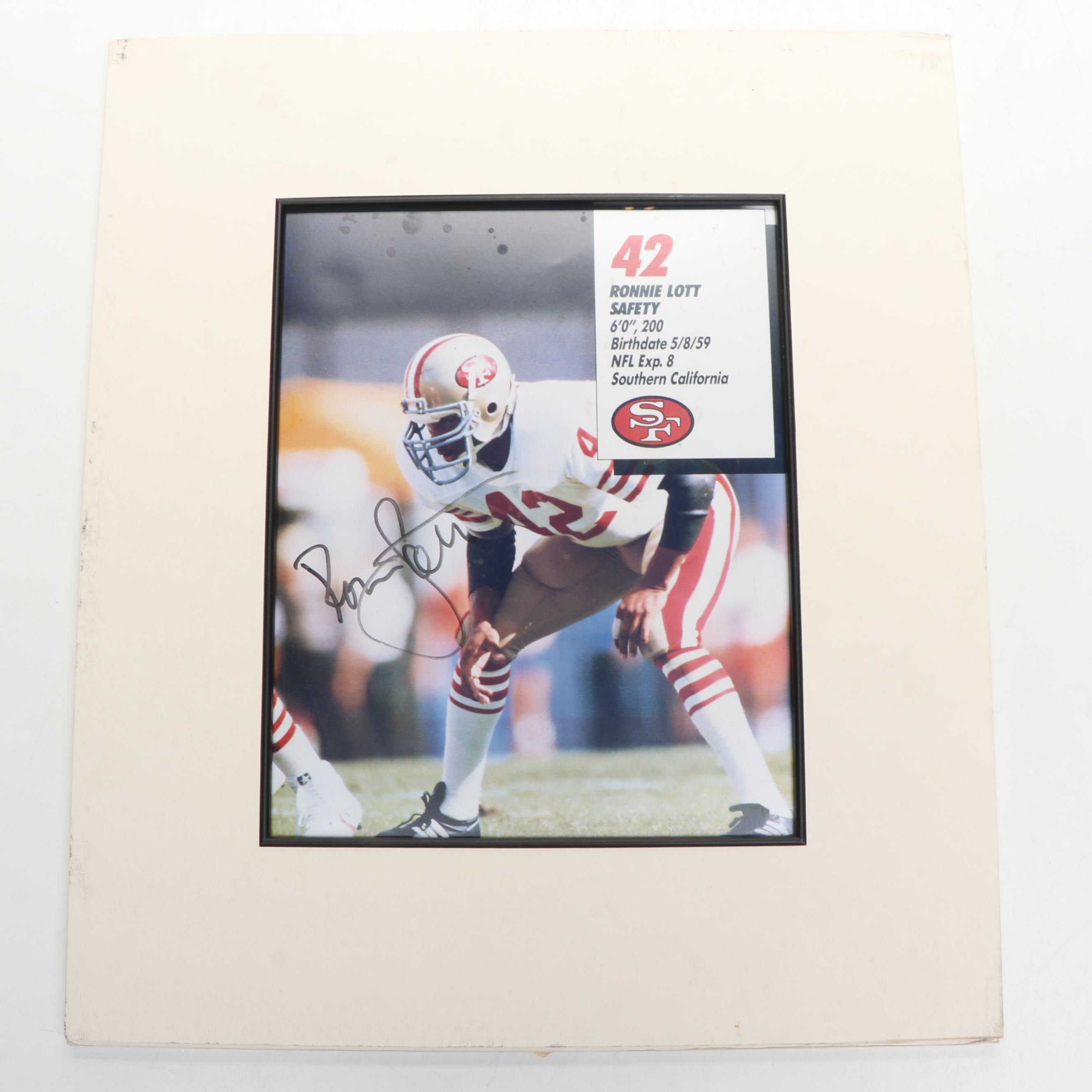 Ronnie Lott and Roger Craig Signed Photos with San Francisco 49ers 1989 Yearbook