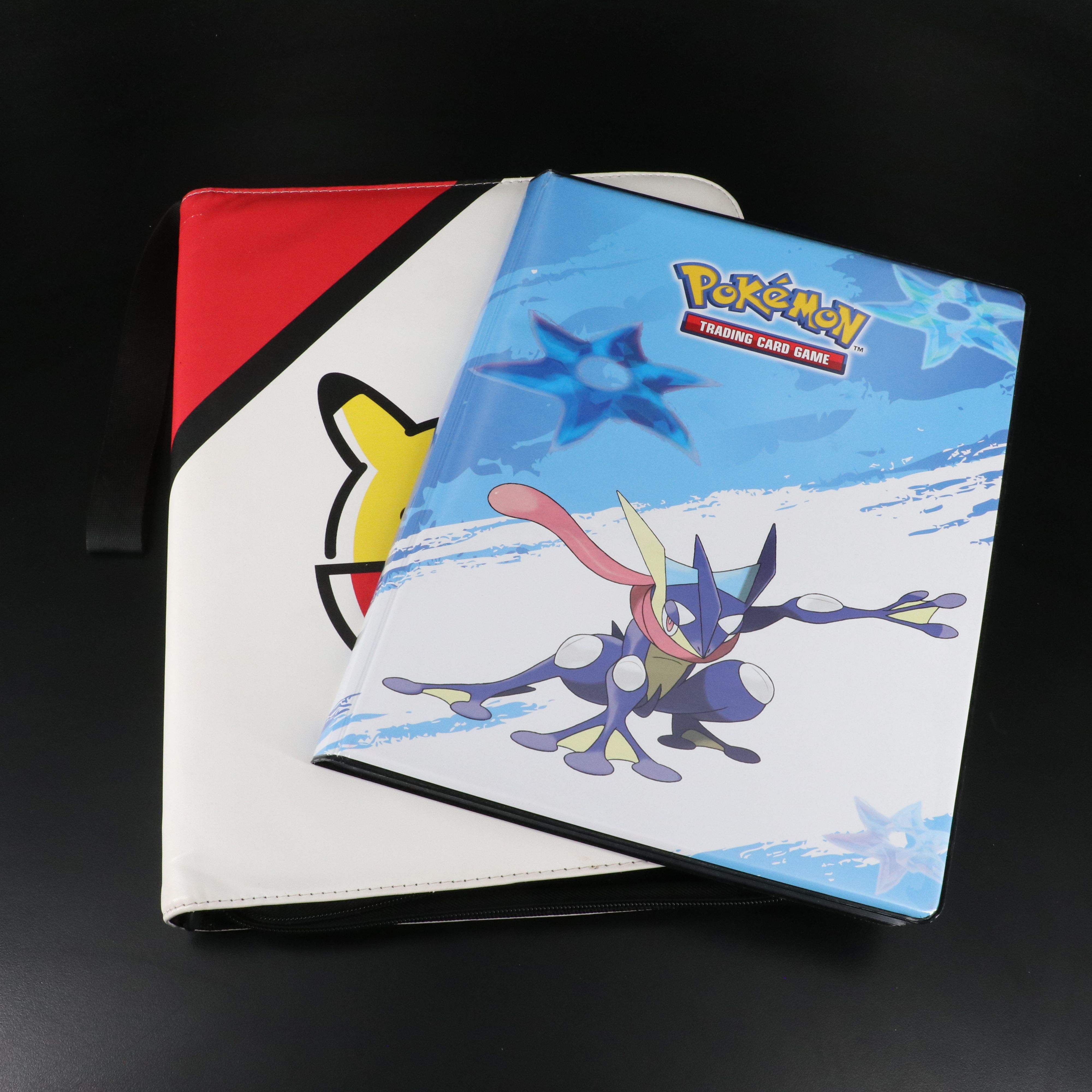 Over 660 Pokemon Trading Cards in Two Binders