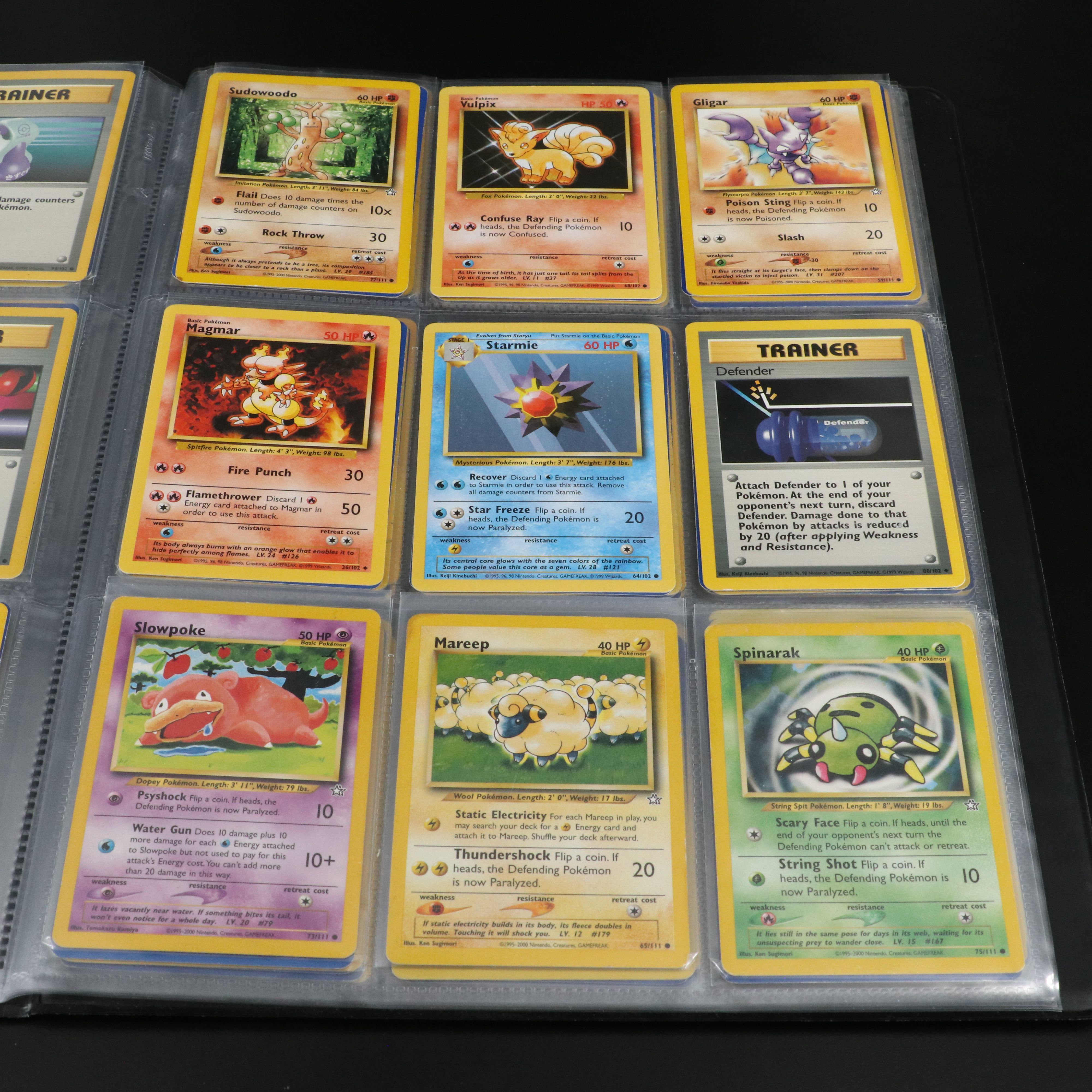Over 660 Pokemon Trading Cards in Two Binders