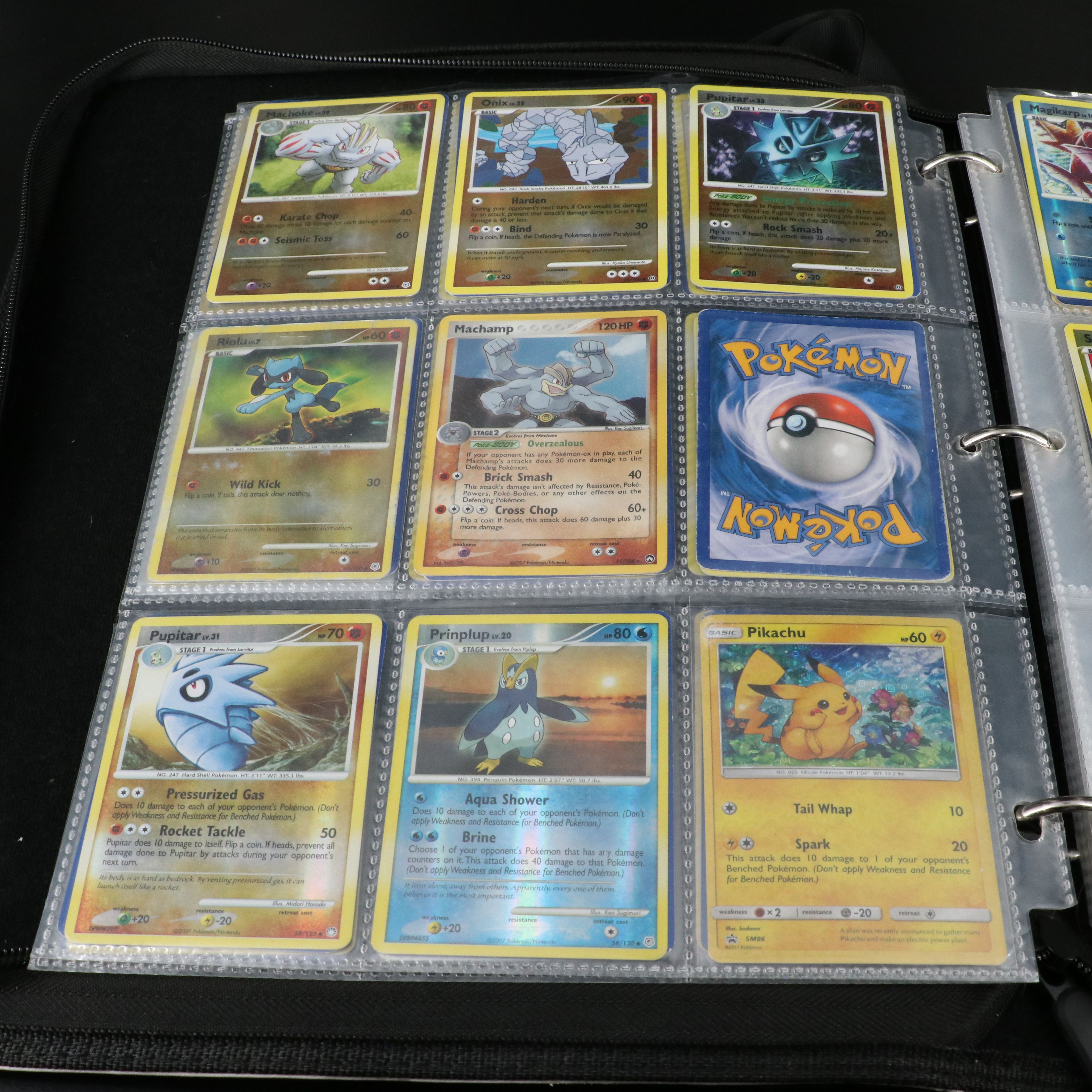 Over 660 Pokemon Trading Cards in Two Binders