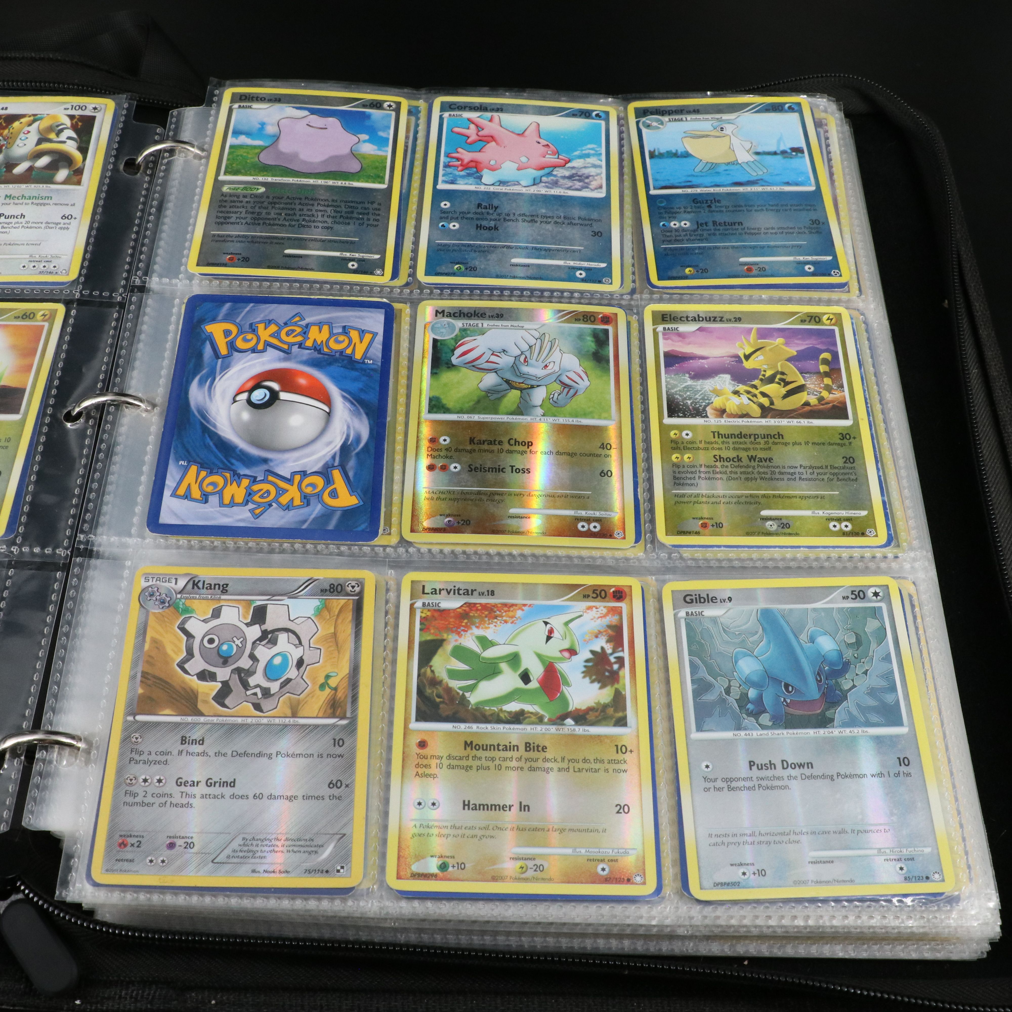 Over 660 Pokemon Trading Cards in Two Binders