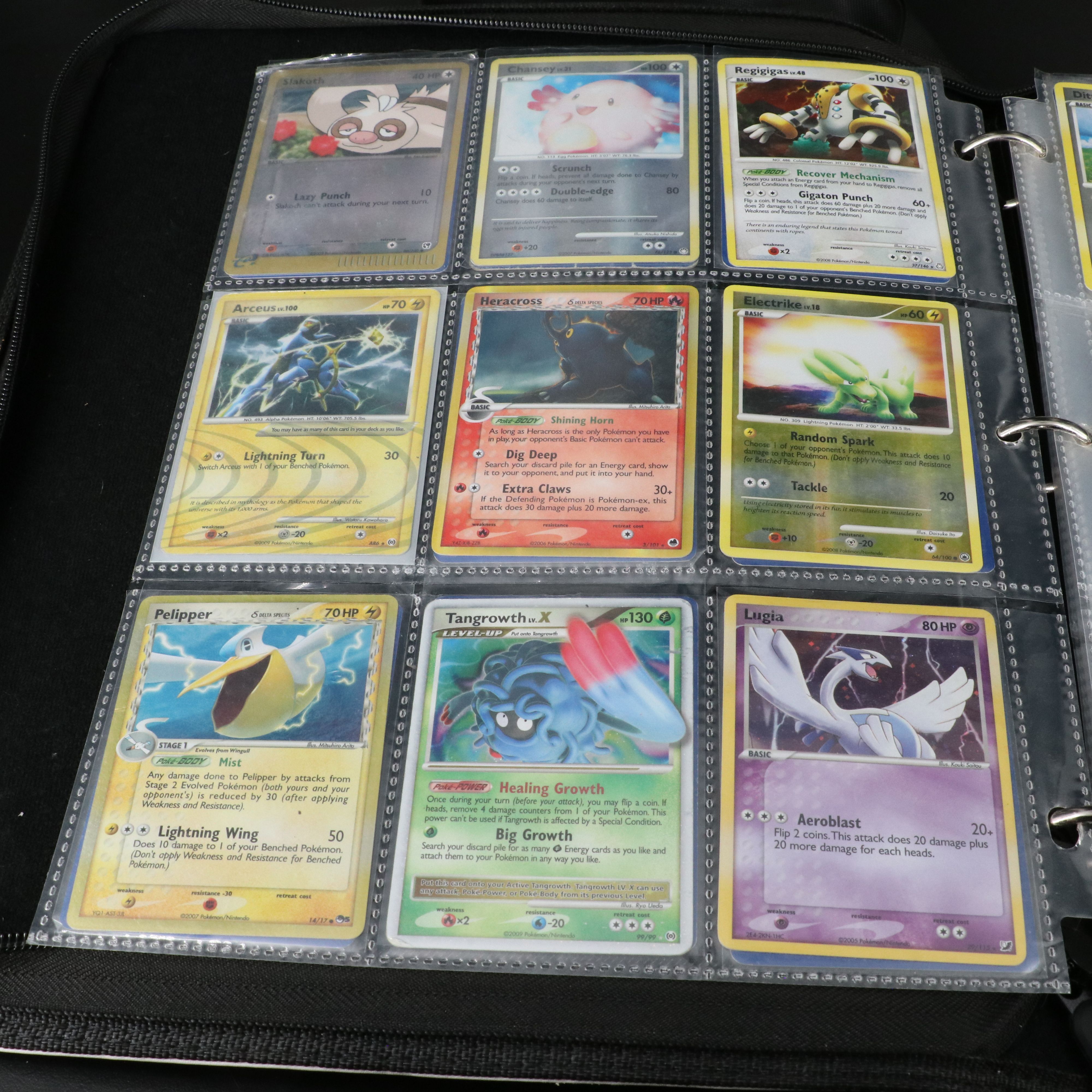 Over 660 Pokemon Trading Cards in Two Binders