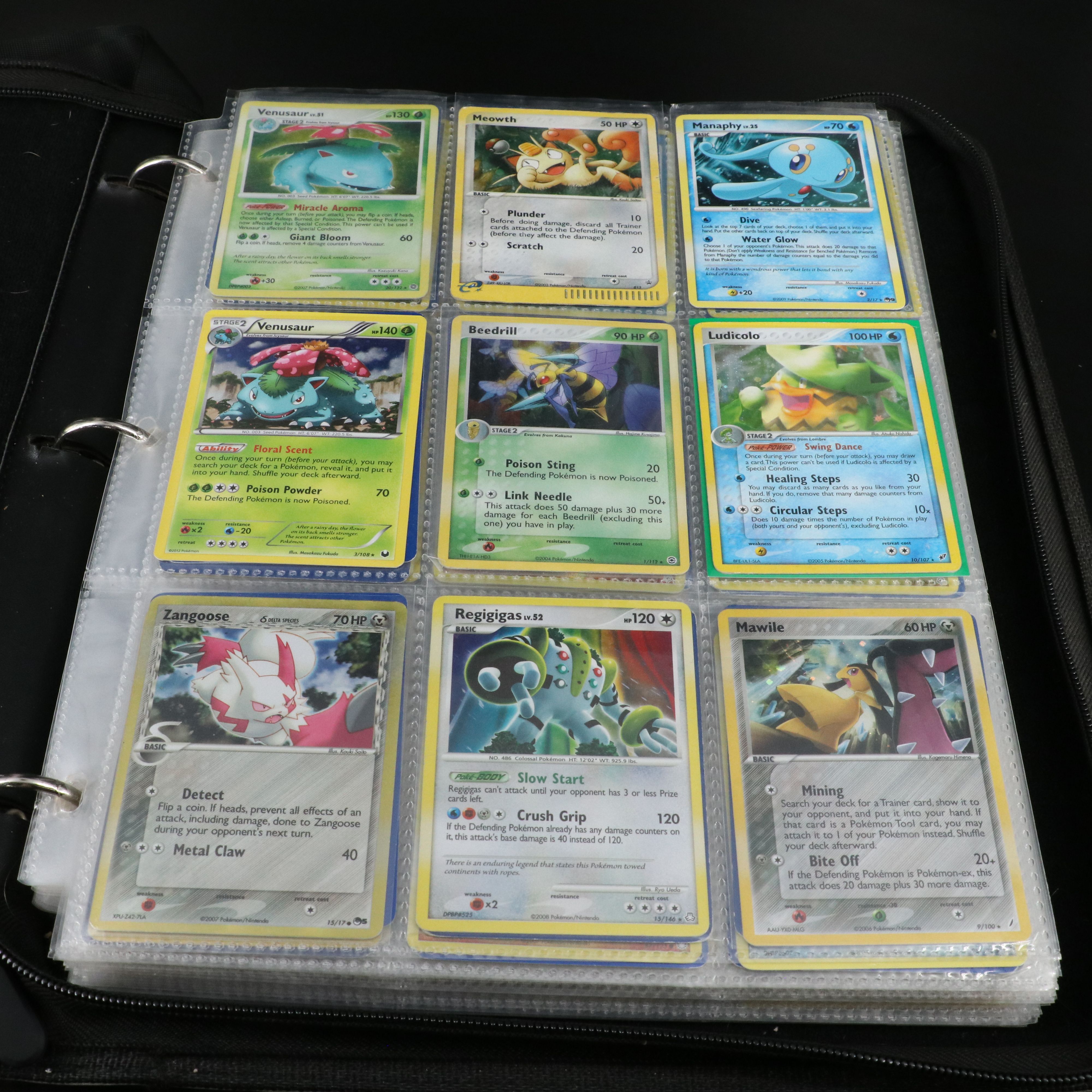 Over 660 Pokemon Trading Cards in Two Binders
