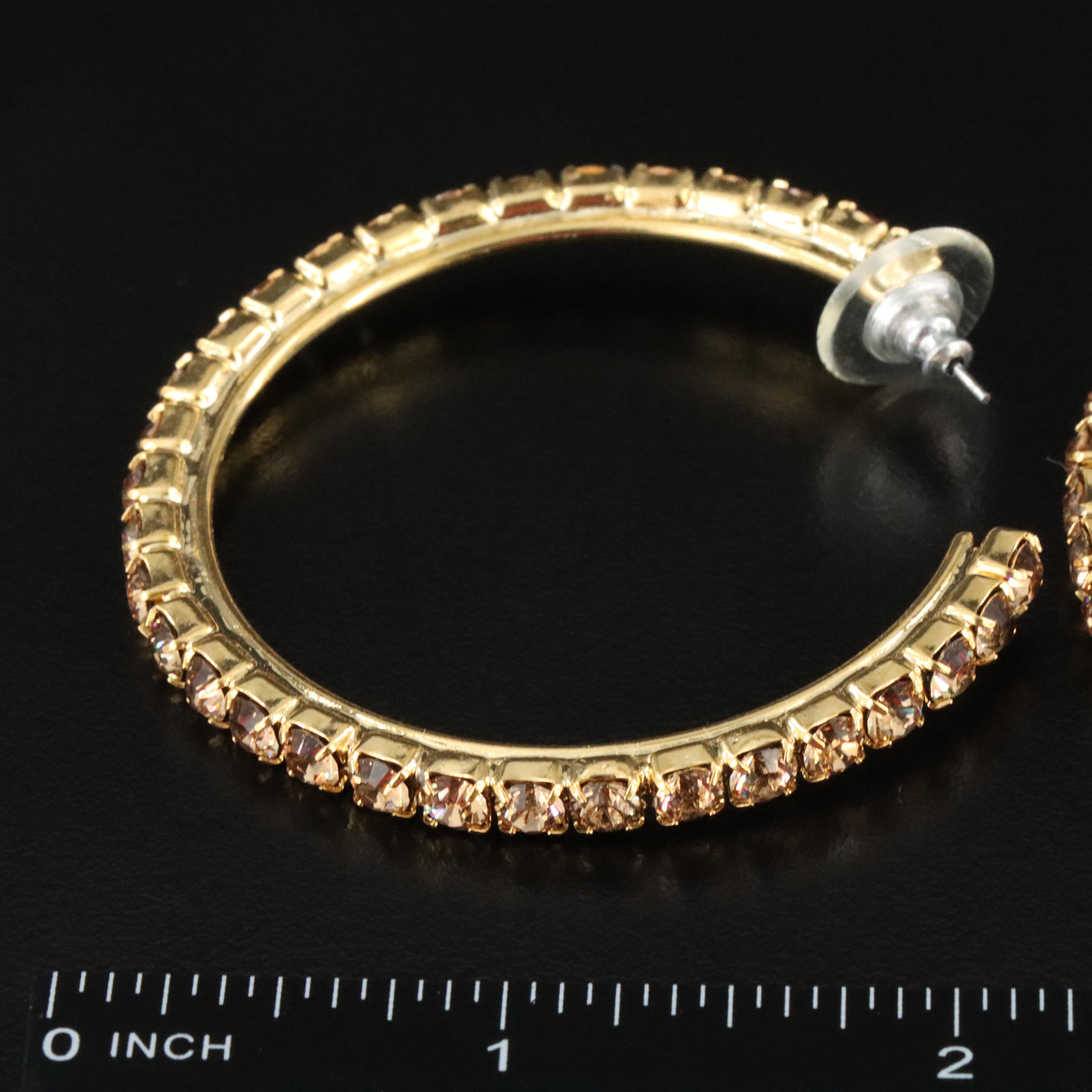 Hoop Earrings, Daniel Swarovski Bracelet and Swarovski Star Earrings