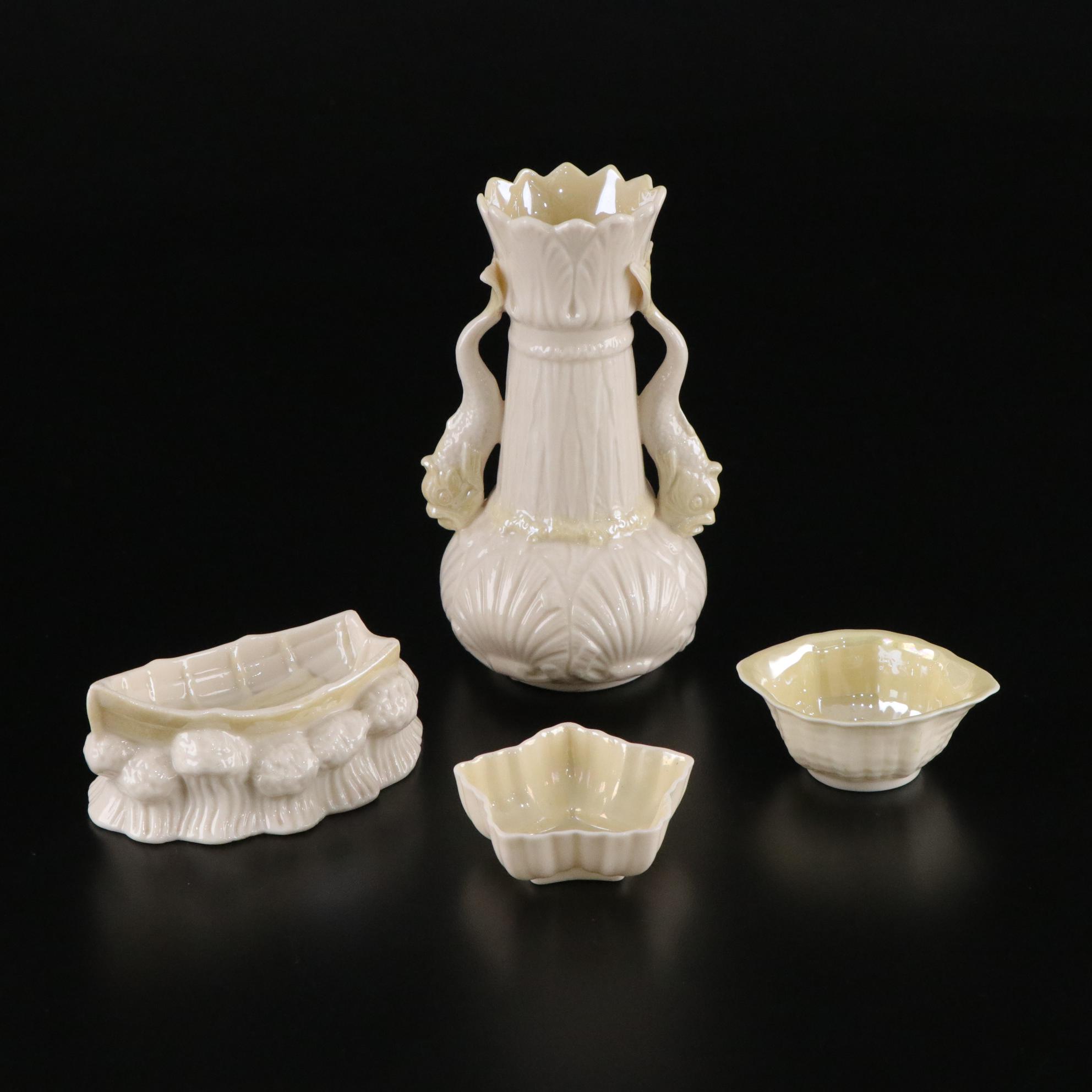 Belleek Porcelain "Dolphin" Spill Vase, Boat Shaped Ashtray, and Two Nut Cups
