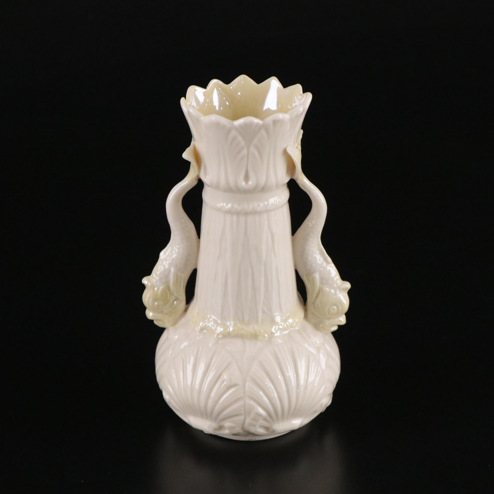 Belleek Porcelain "Dolphin" Spill Vase, Boat Shaped Ashtray, and Two Nut Cups