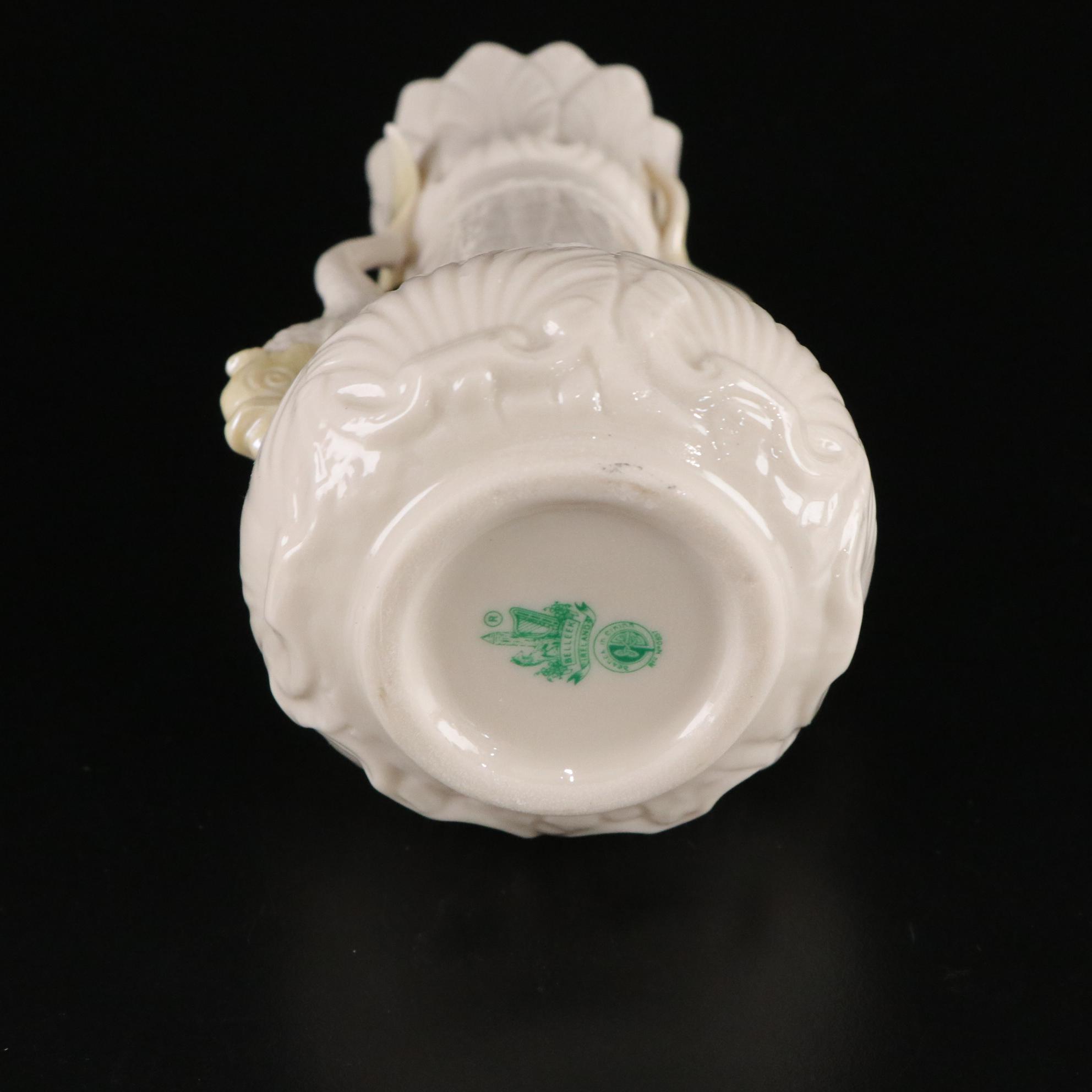 Belleek Porcelain "Dolphin" Spill Vase, Boat Shaped Ashtray, and Two Nut Cups