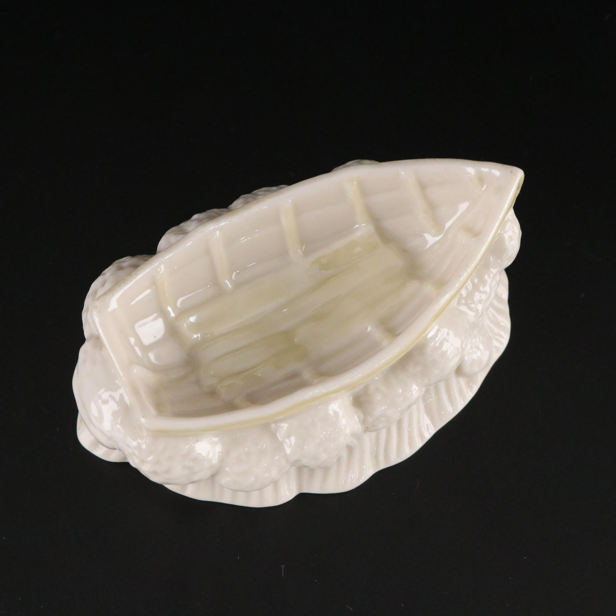 Belleek Porcelain "Dolphin" Spill Vase, Boat Shaped Ashtray, and Two Nut Cups