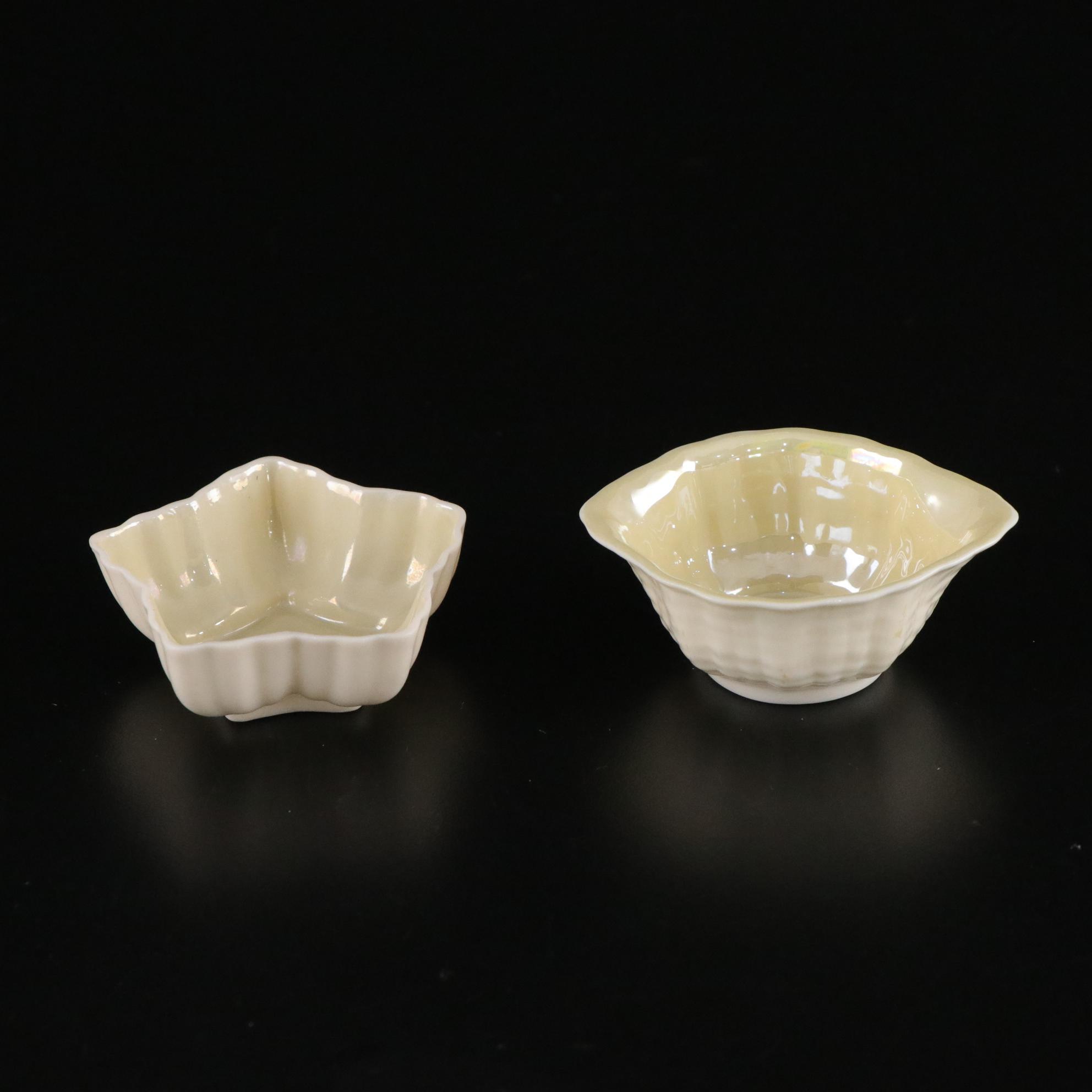 Belleek Porcelain "Dolphin" Spill Vase, Boat Shaped Ashtray, and Two Nut Cups