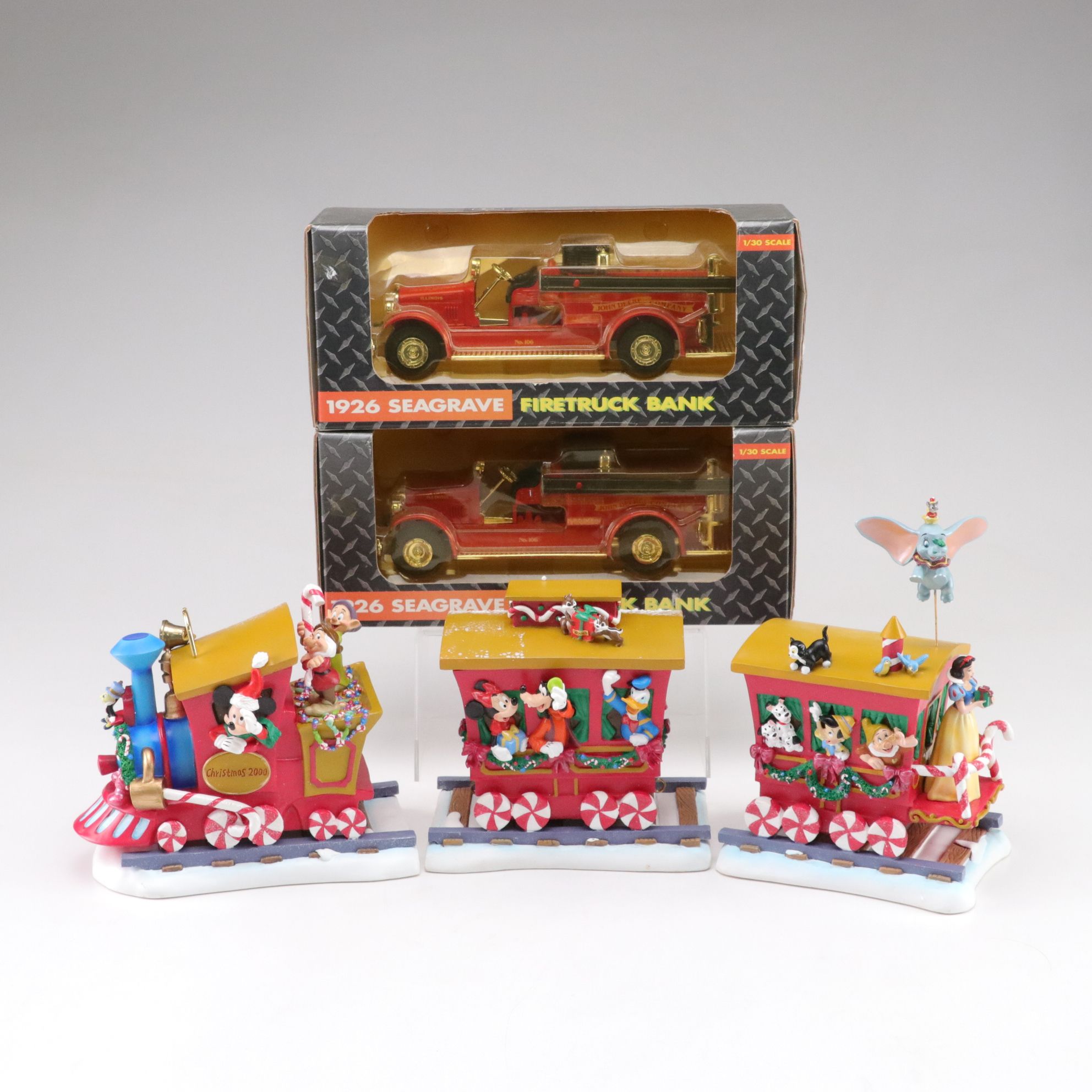 Hallmark Disney Christmas Musical Train Set 2000 with John Deere Firetruck Bank