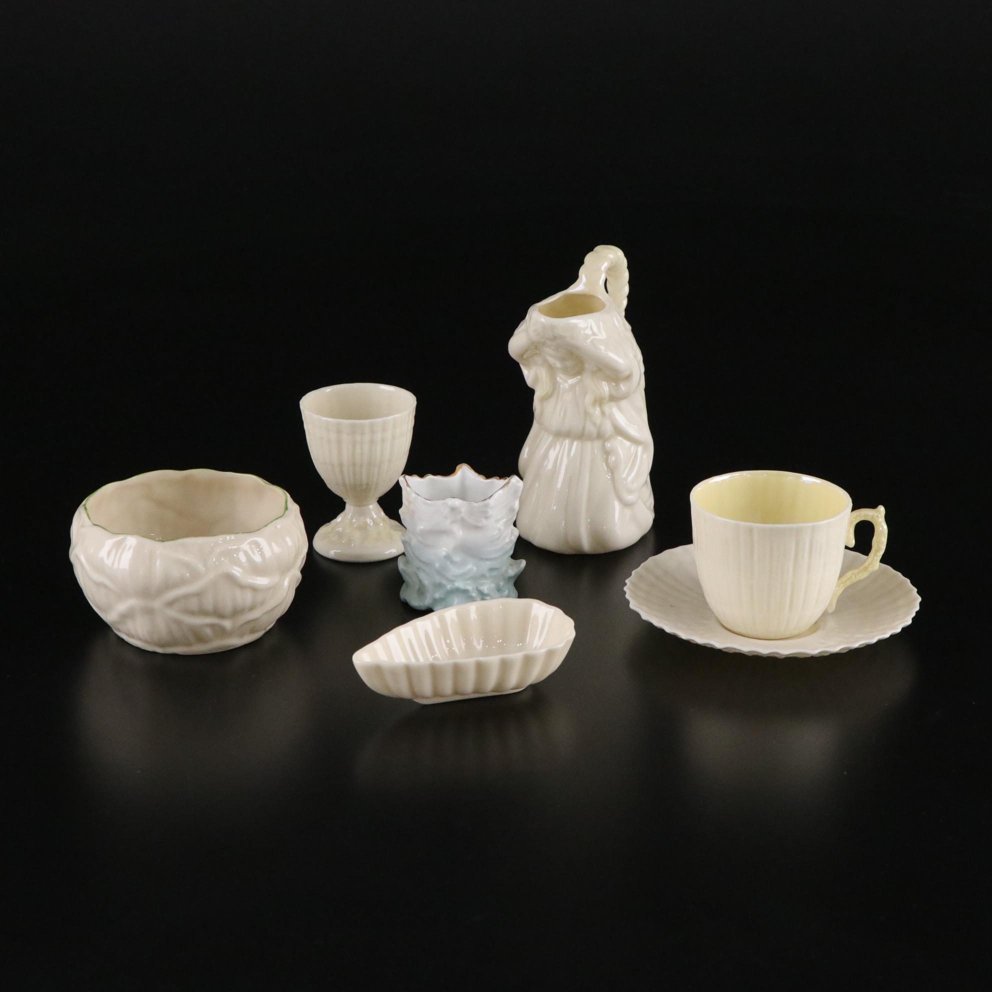 Belleek "Kneeling Girl" Creamer with "Limpet Yellow" and More Porcelain Pieces