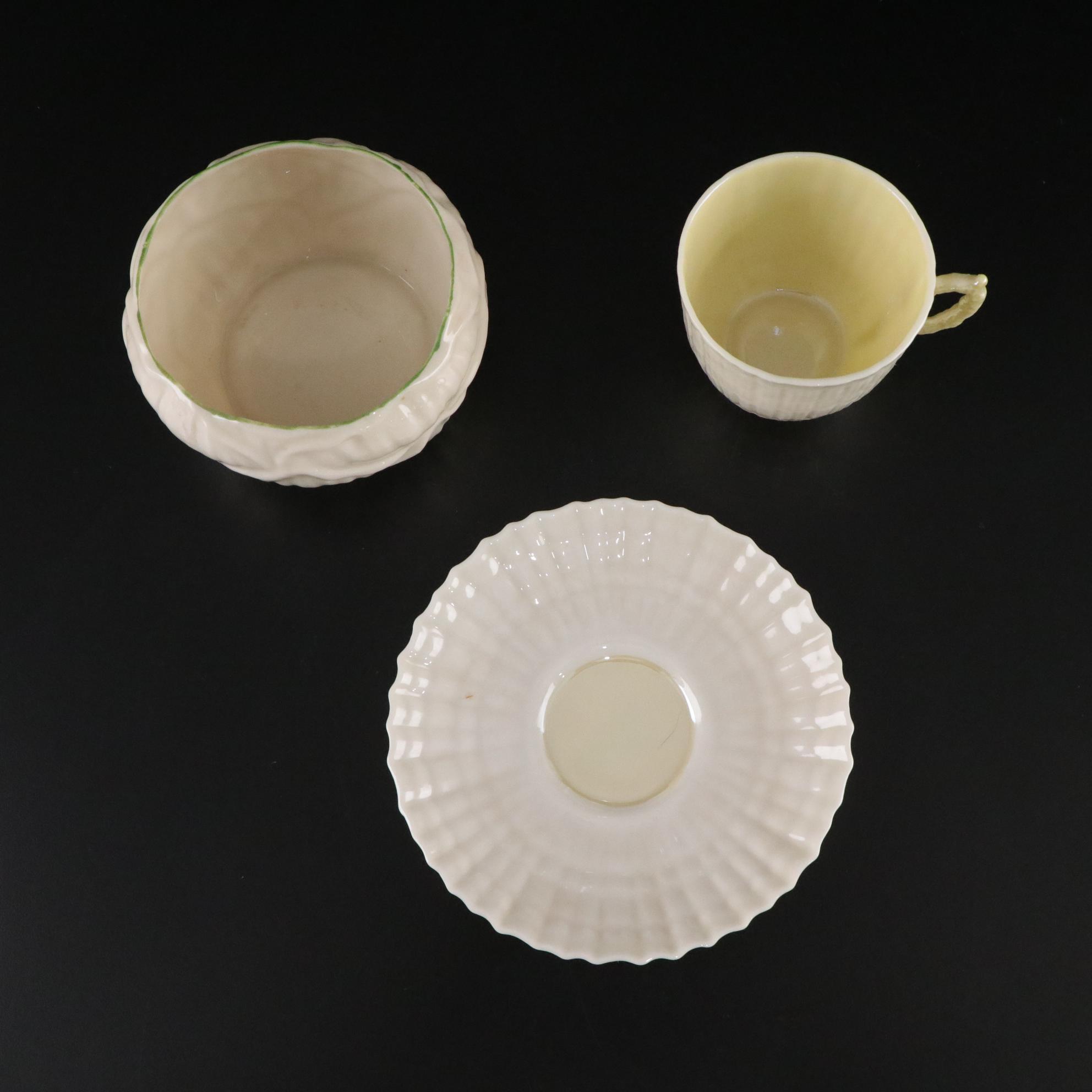 Belleek "Kneeling Girl" Creamer with "Limpet Yellow" and More Porcelain Pieces