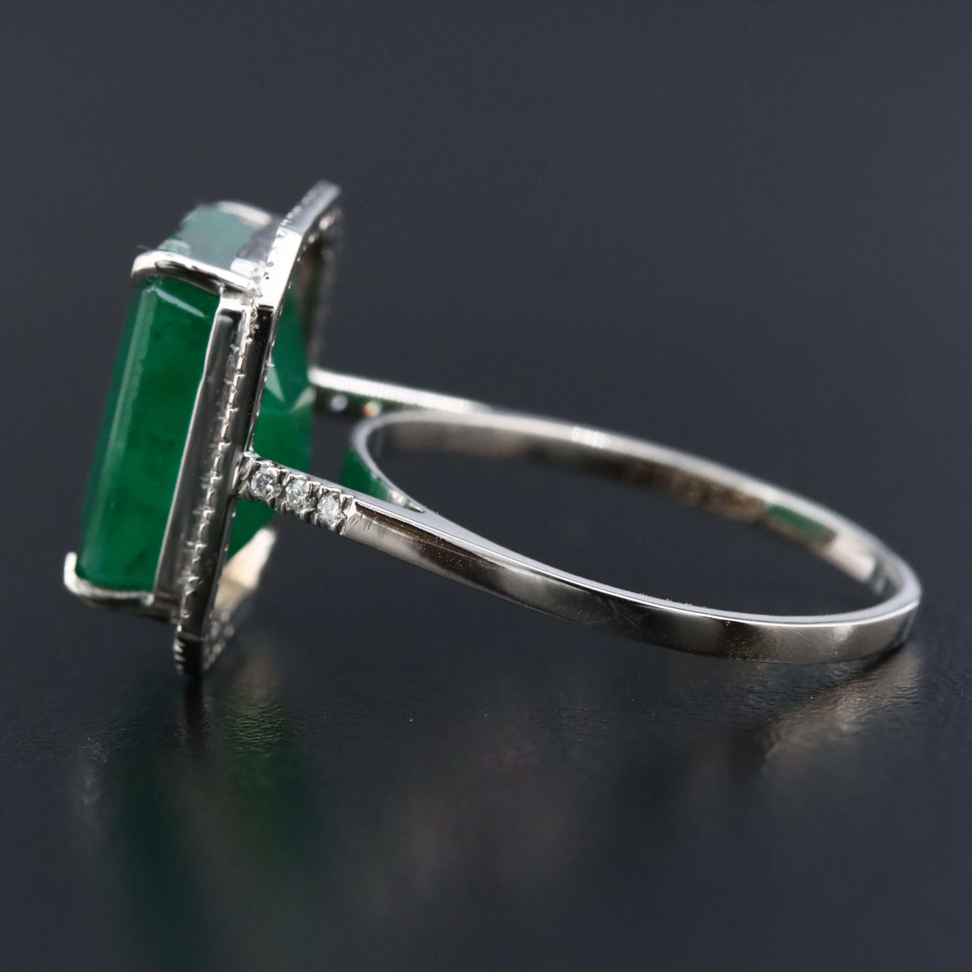 Platinum 6.86 CT Emerald and 0.19 CTW Diamond Ring