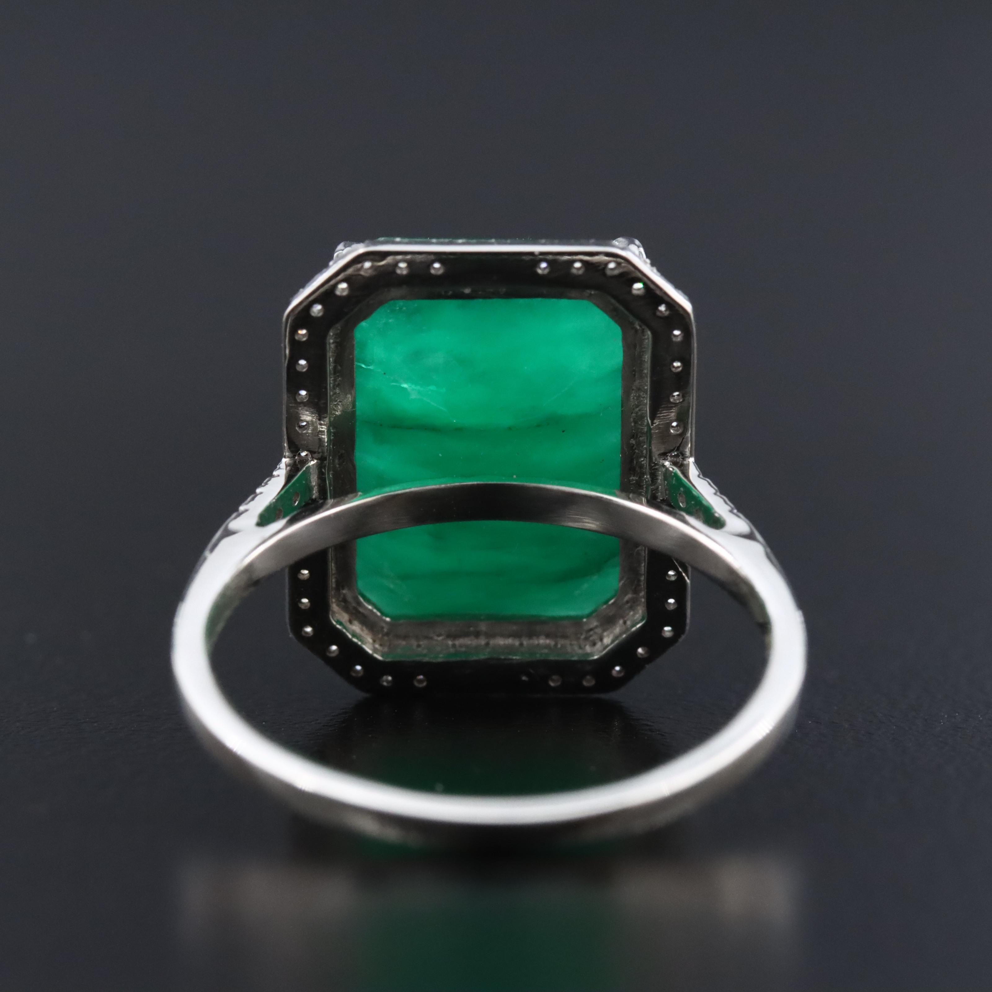 Platinum 5.55 CT Emerald and 0.19 CTW Diamond Ring