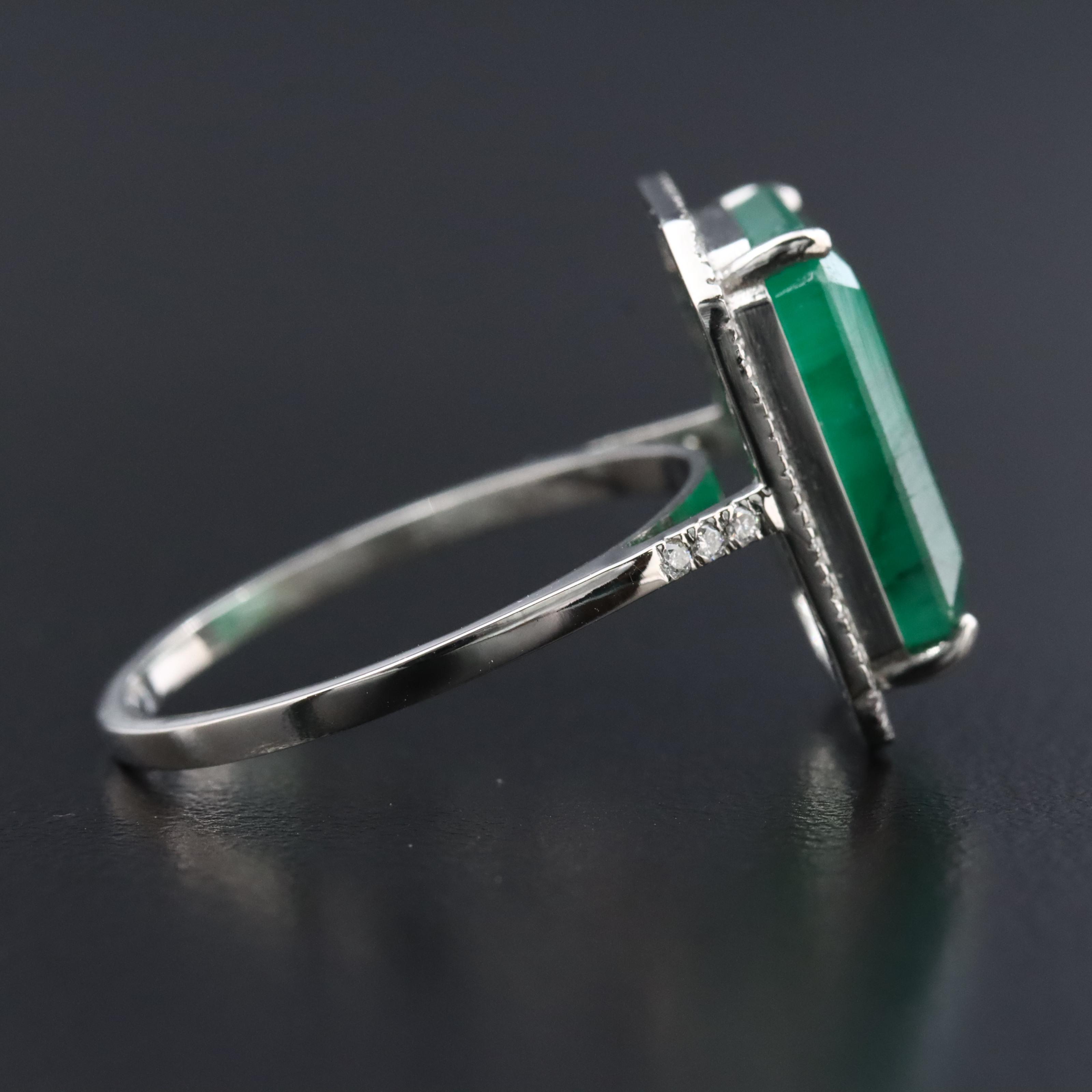 Platinum 5.55 CT Emerald and 0.19 CTW Diamond Ring