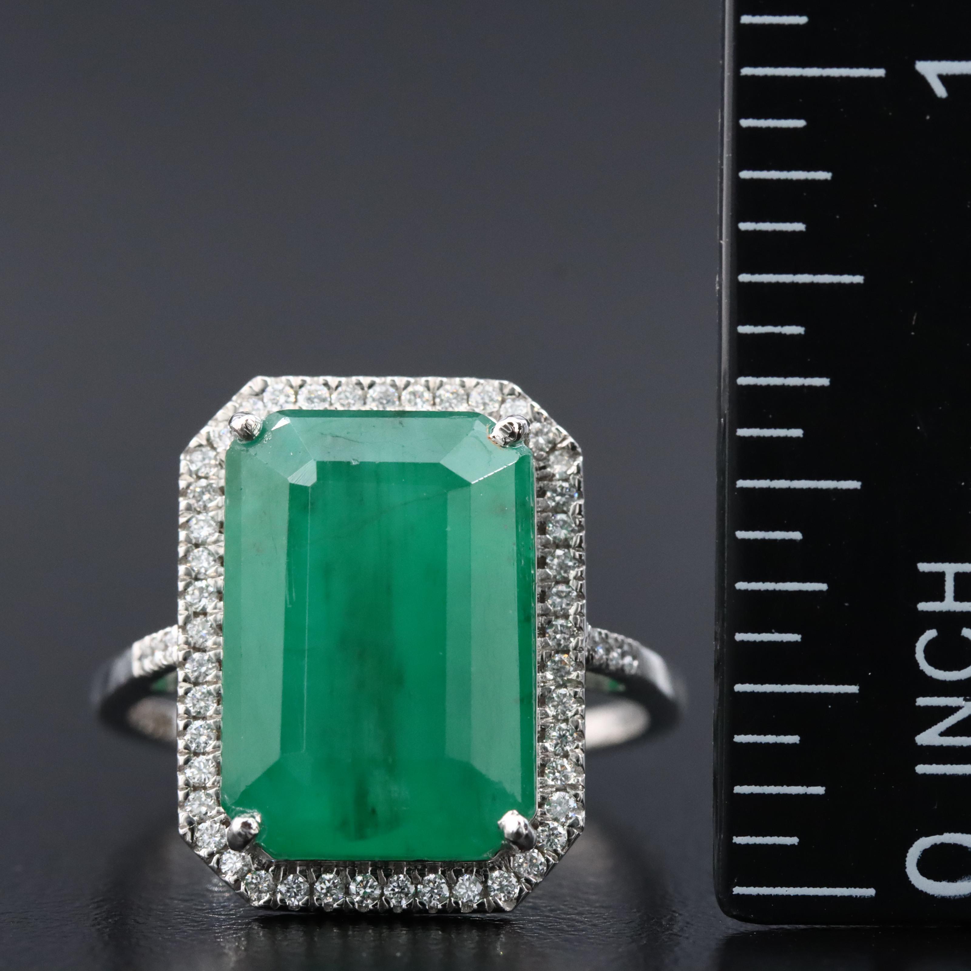 Platinum 6.38 CT Emerald and 0.20 CTW Diamond Ring