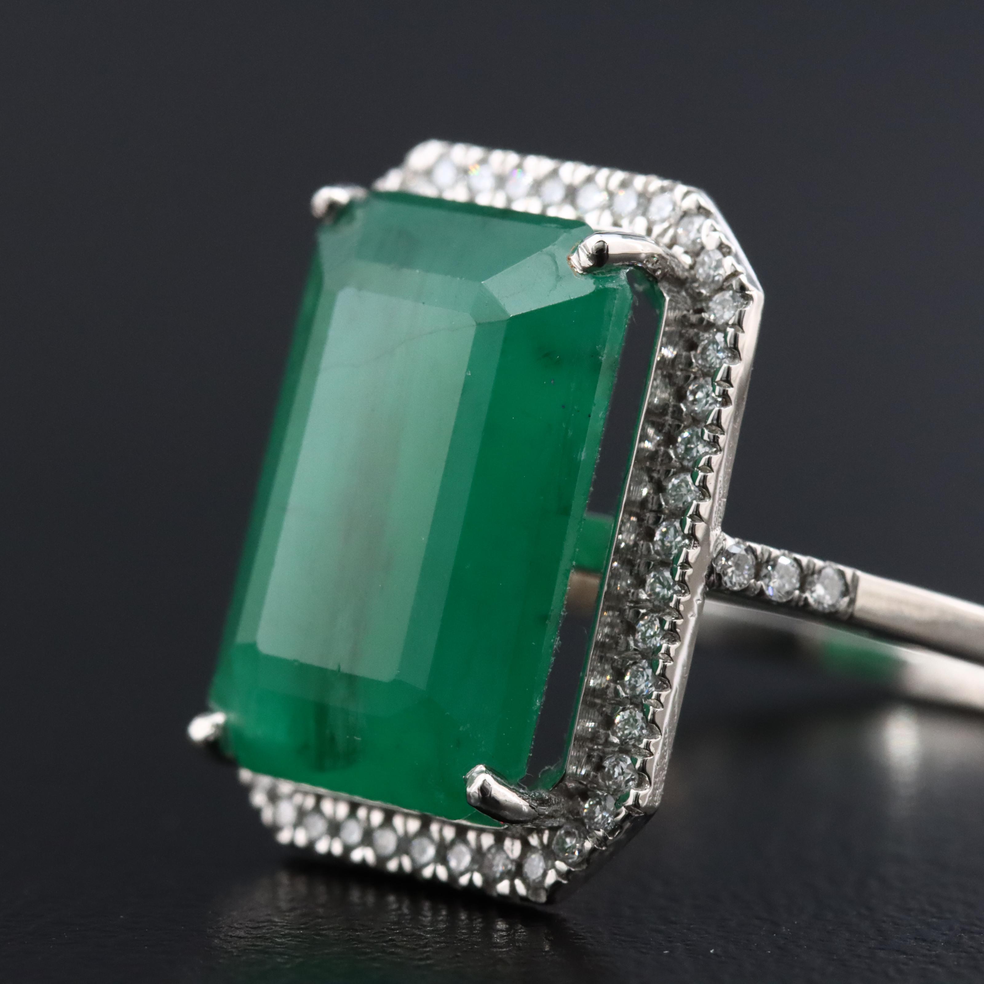Platinum 6.38 CT Emerald and 0.20 CTW Diamond Ring