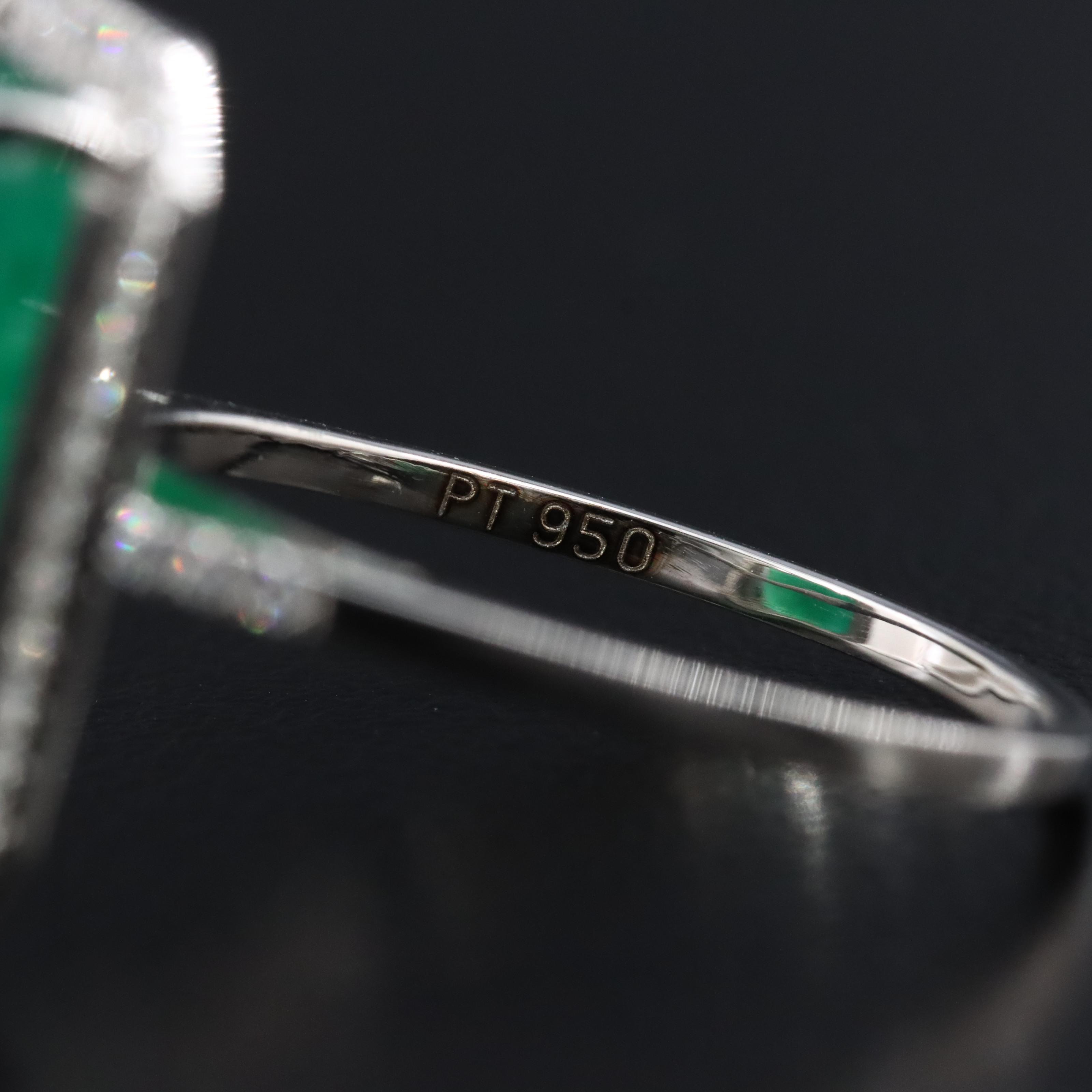 Platinum 6.38 CT Emerald and 0.20 CTW Diamond Ring
