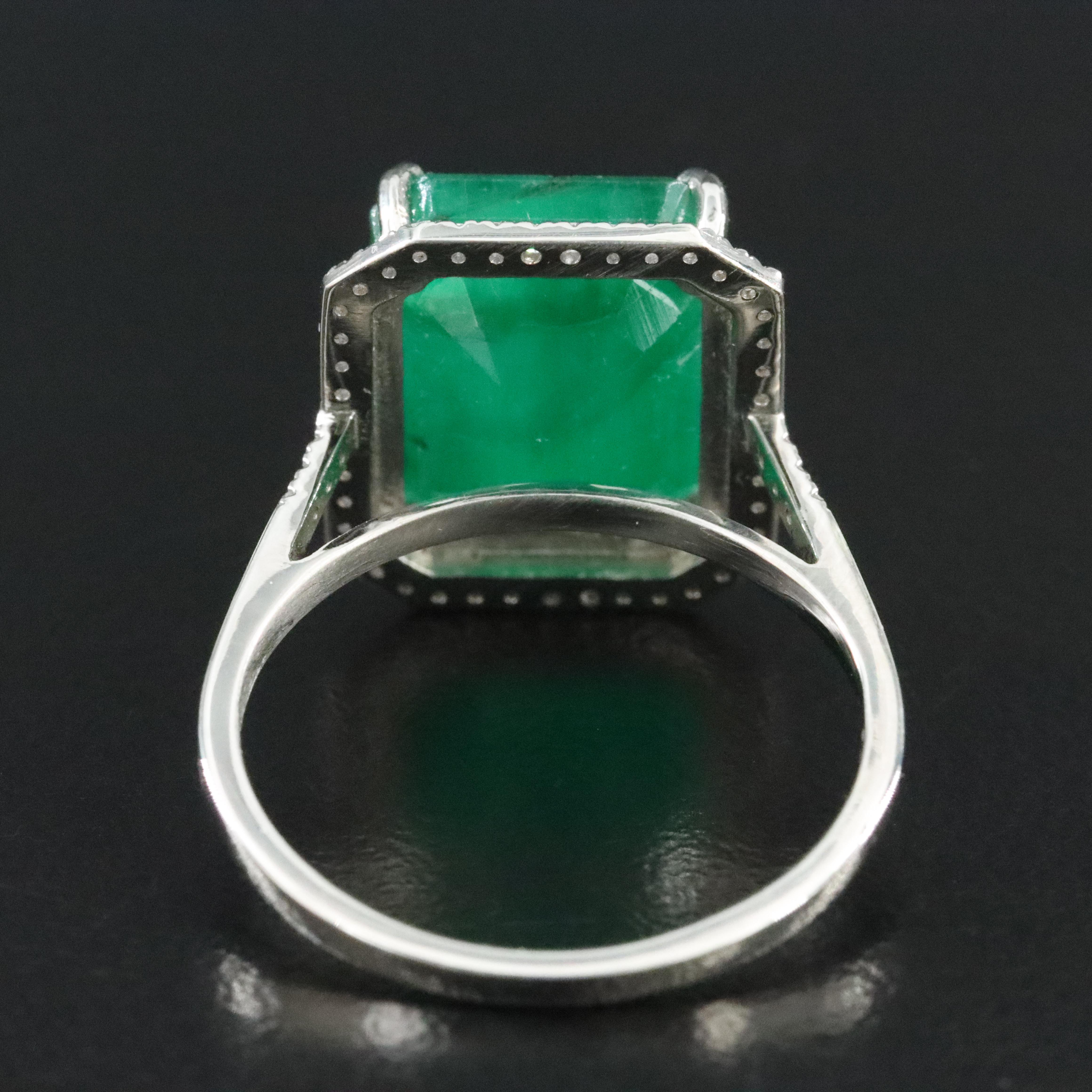Platinum 8.88 CT Emerald and 0.20 CTW Diamond Ring