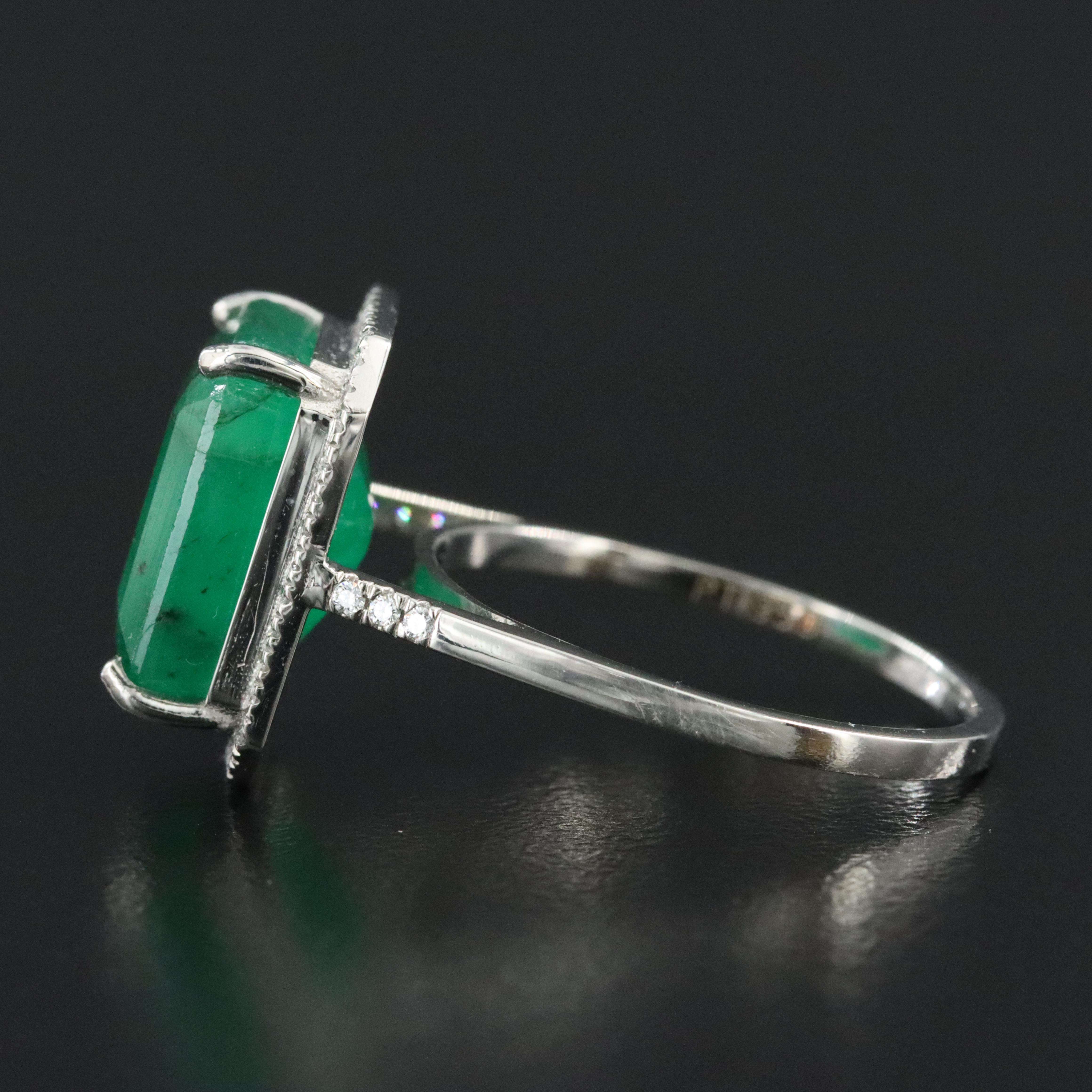 Platinum 8.88 CT Emerald and 0.20 CTW Diamond Ring