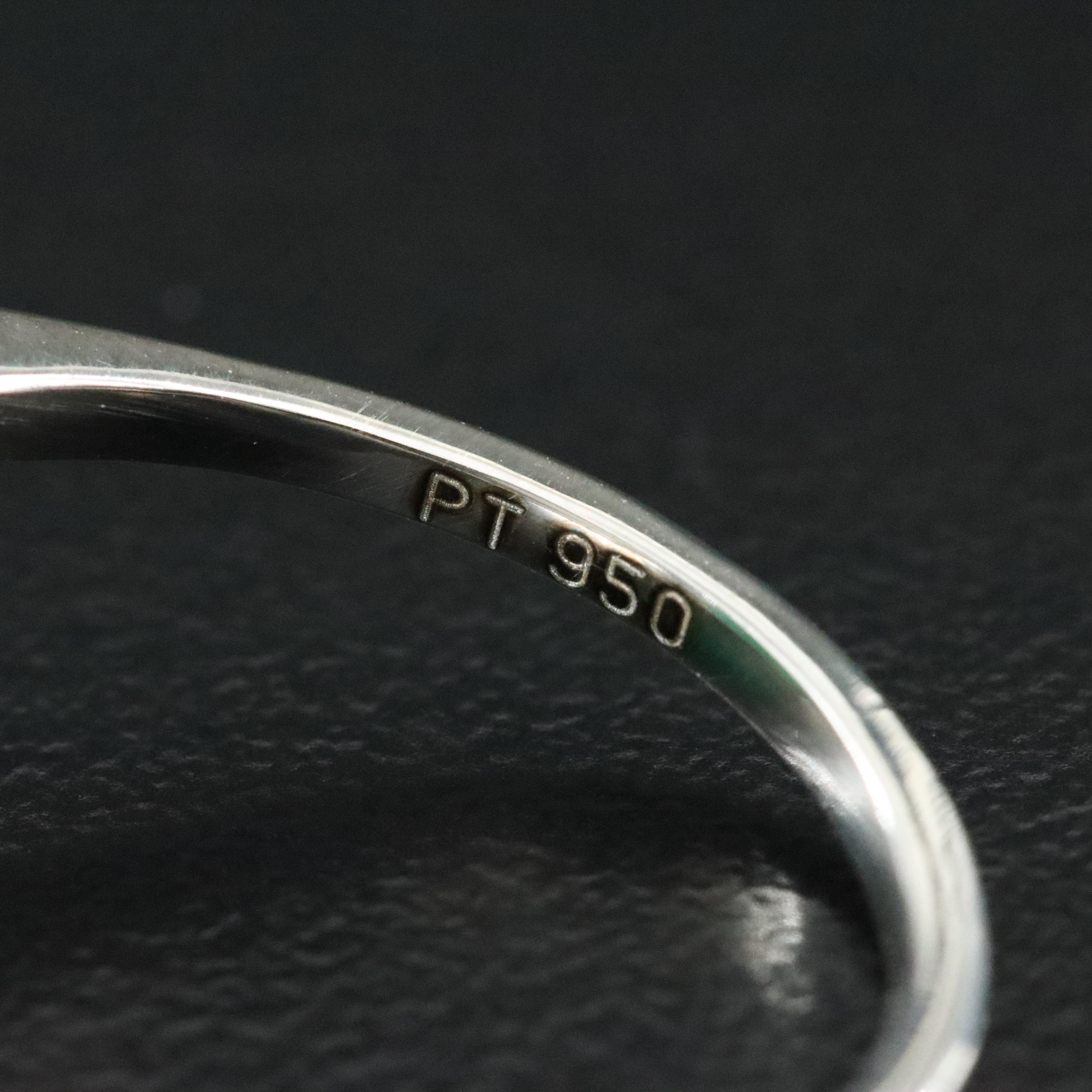 Platinum 8.88 CT Emerald and 0.20 CTW Diamond Ring