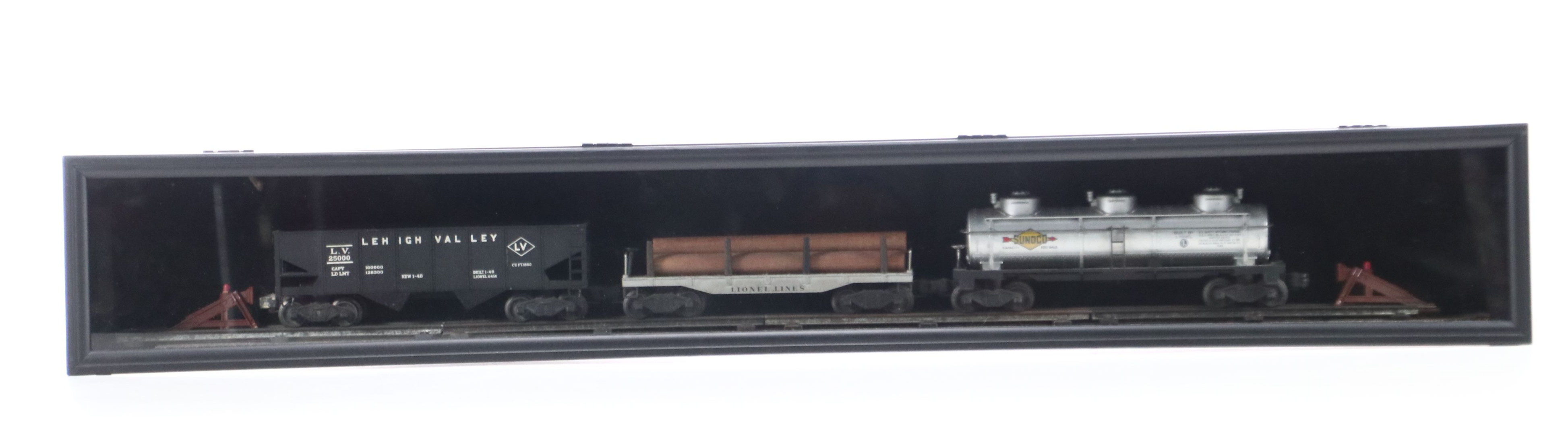 Lionel Steam Locomotive, Sunoco Tanker, Blue Box Car, and Other Freight Cars