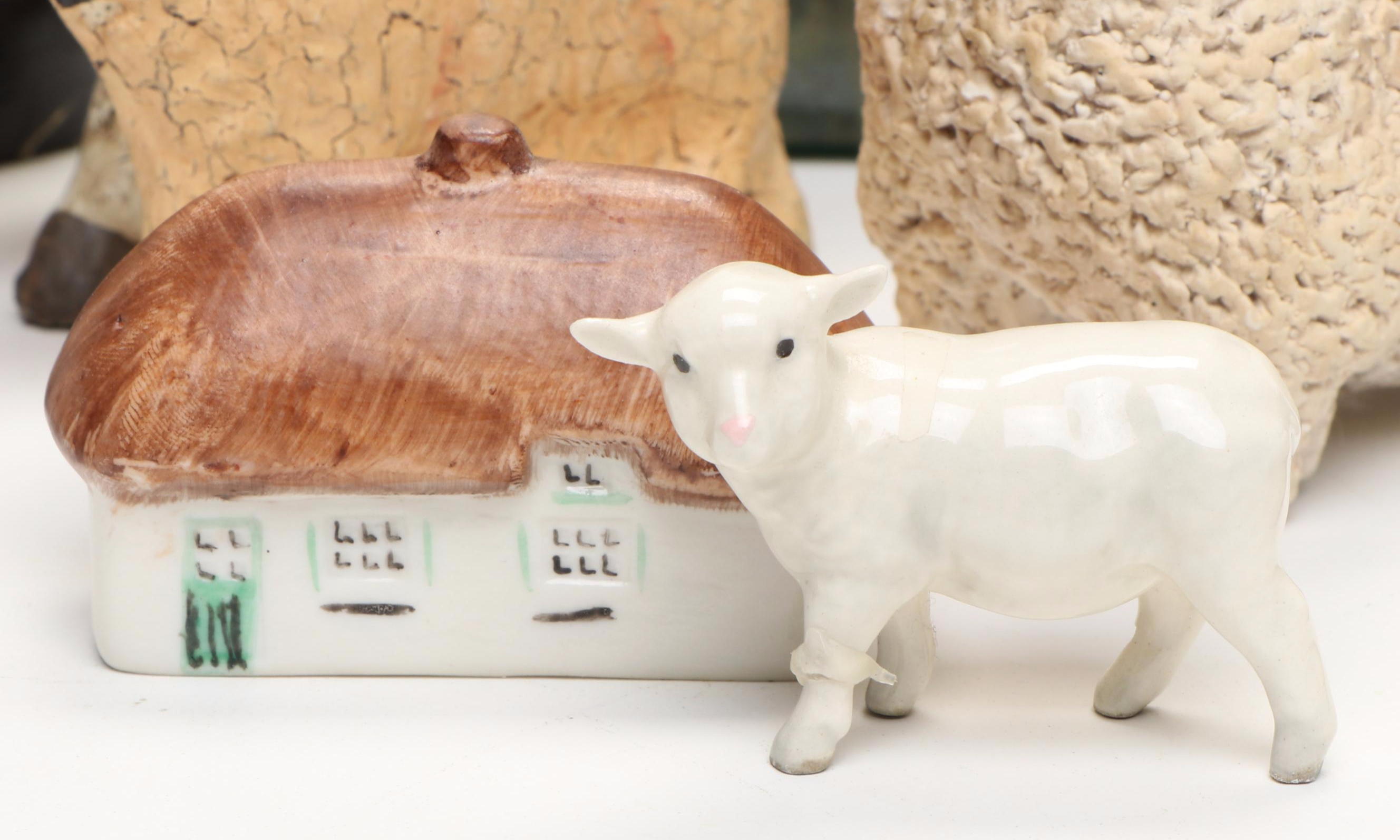 Collection of Ceramic, Cast Iron, and Other Sheep Figurines