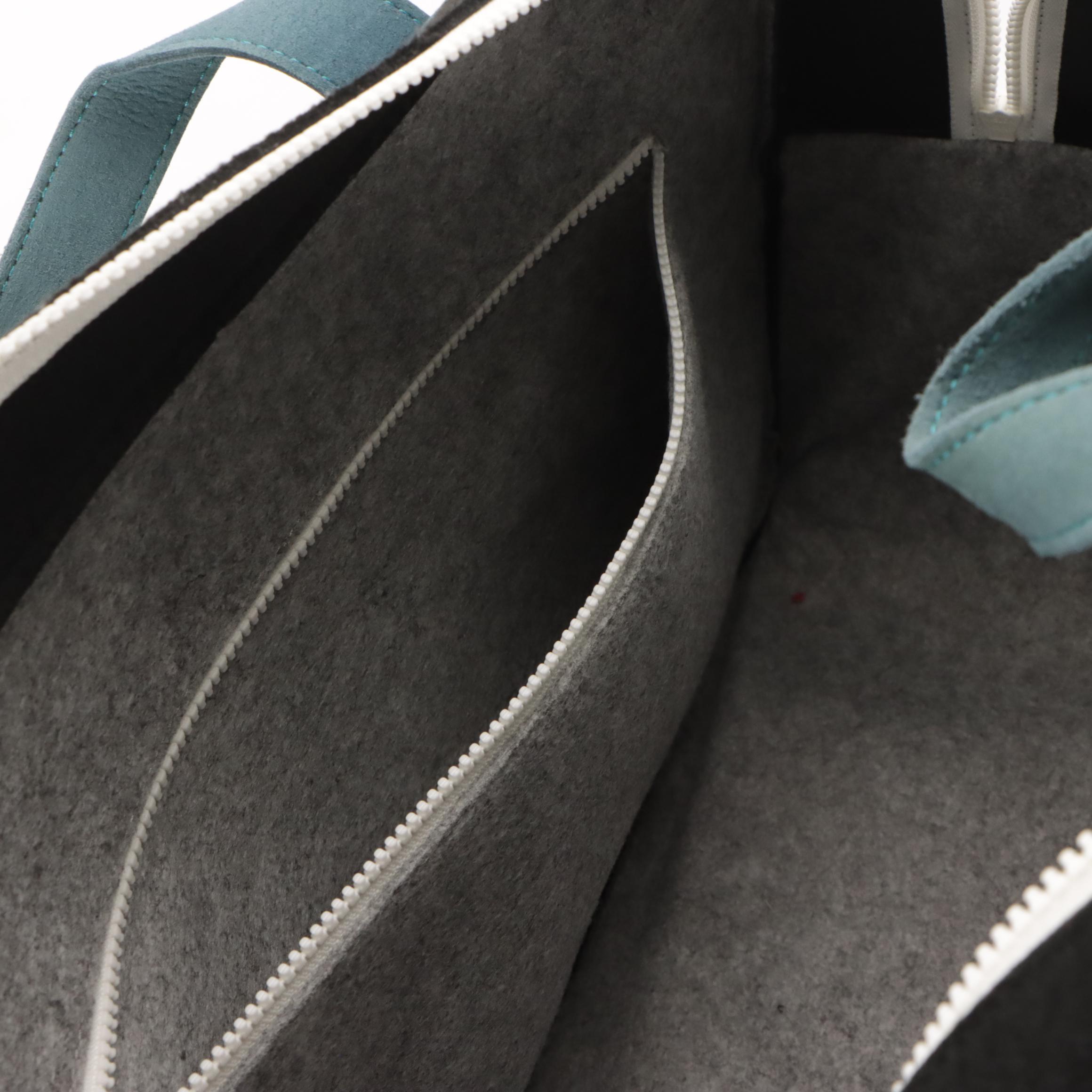 Rawlings Brown Leather Backpack and Mad Rabbit Kicking Tiger Large Two-Way Bag