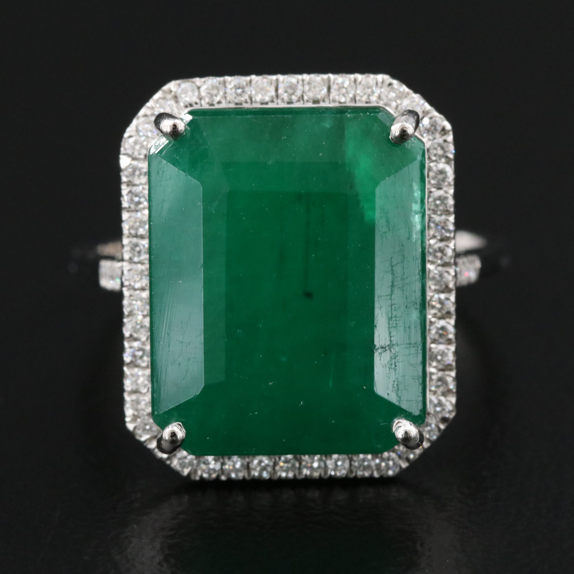 Platinum 8.52 CT Emerald and 0.20 CTW Diamond Ring