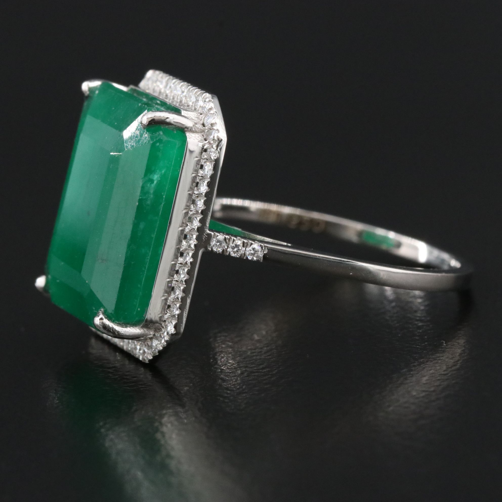 Platinum 8.52 CT Emerald and 0.20 CTW Diamond Ring