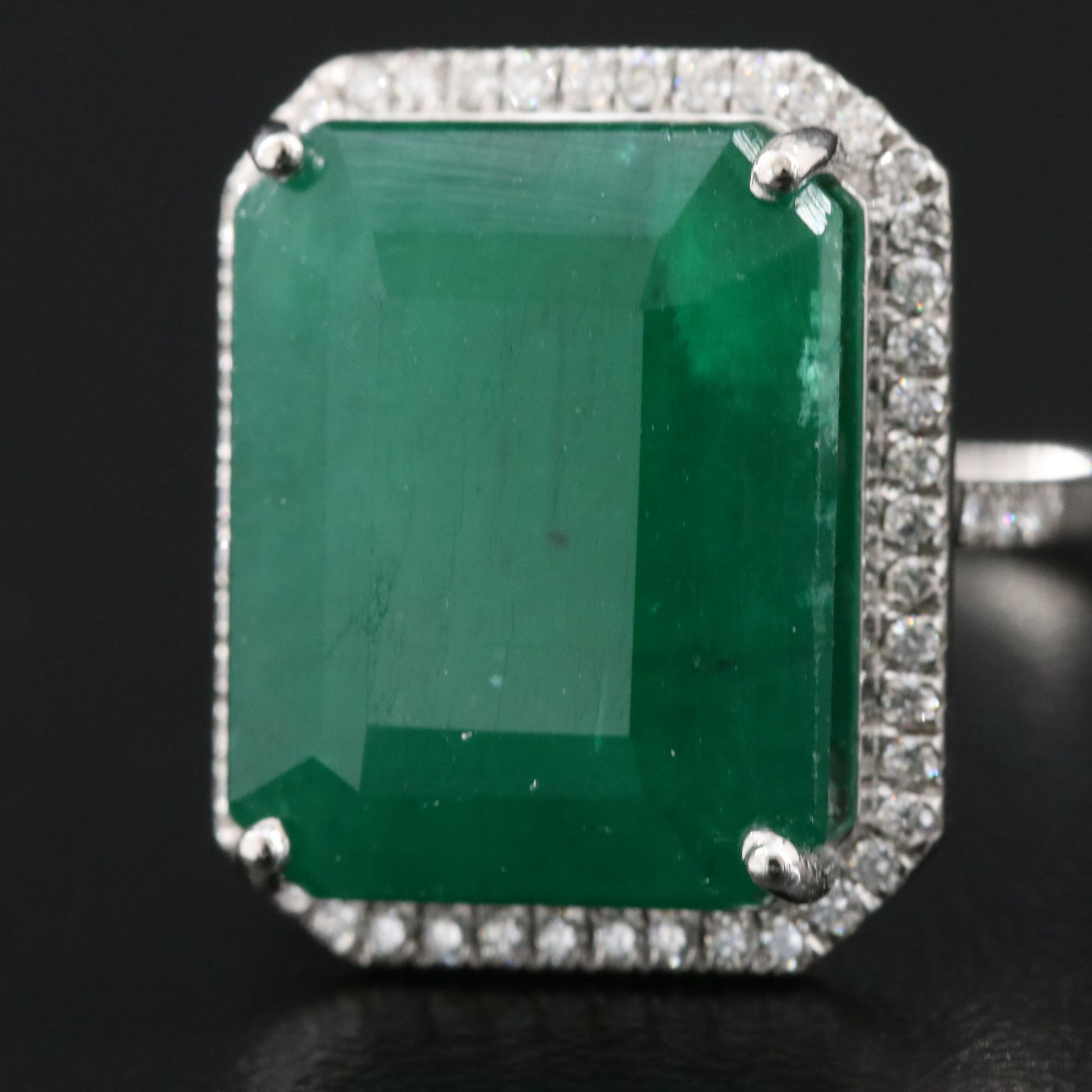 Platinum 8.52 CT Emerald and 0.20 CTW Diamond Ring