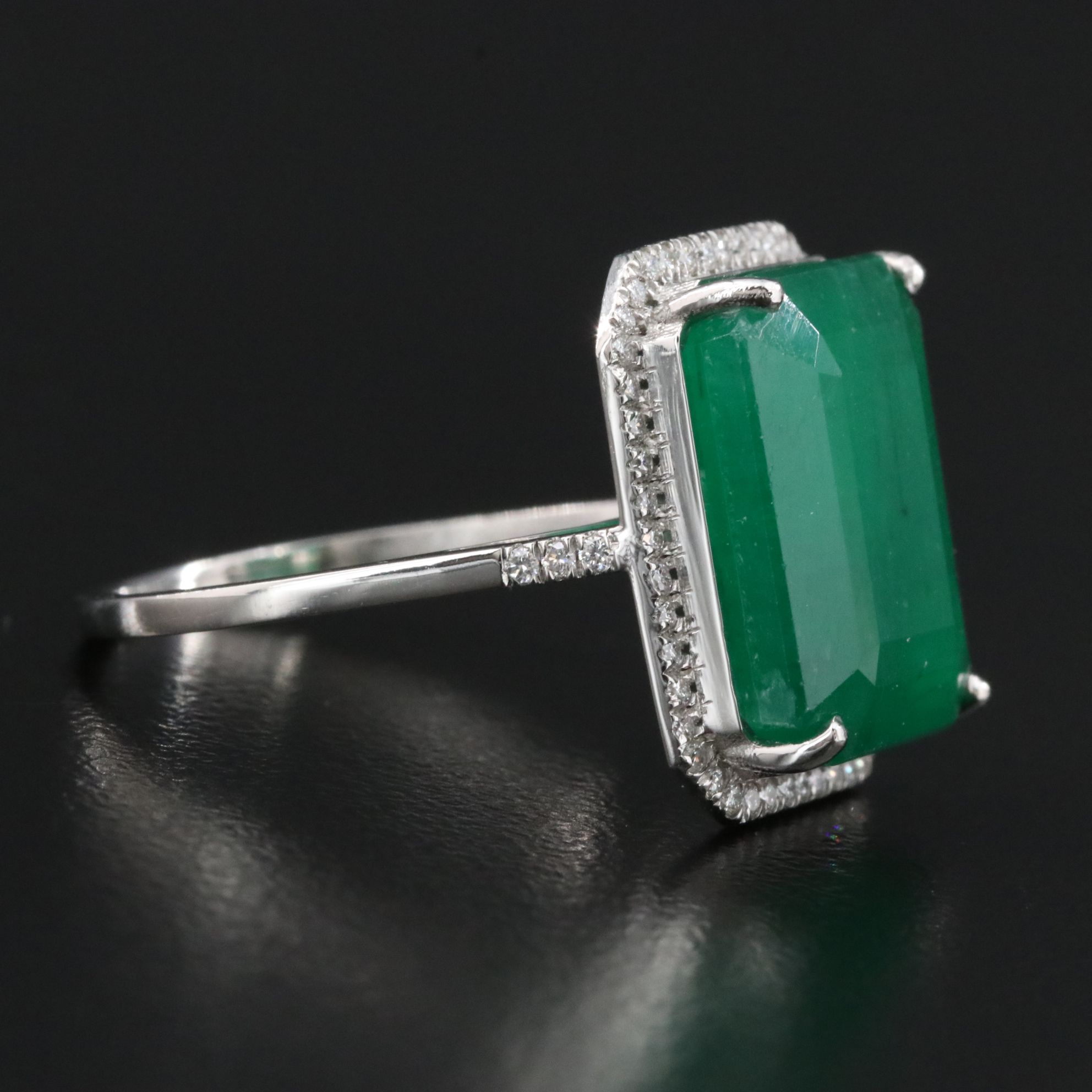 Platinum 8.52 CT Emerald and 0.20 CTW Diamond Ring