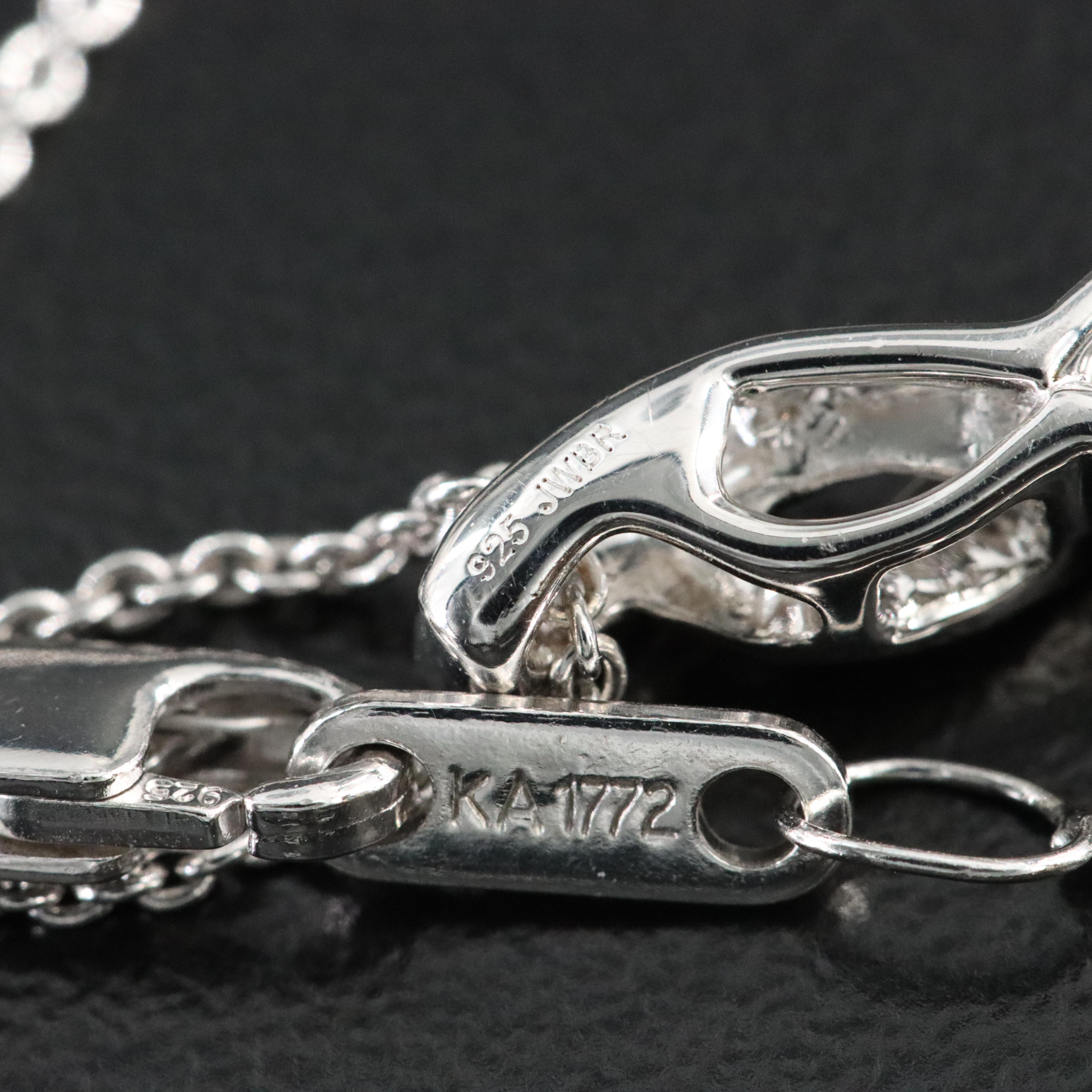 Sterling Twist Pendant Necklace with Diamond Accent