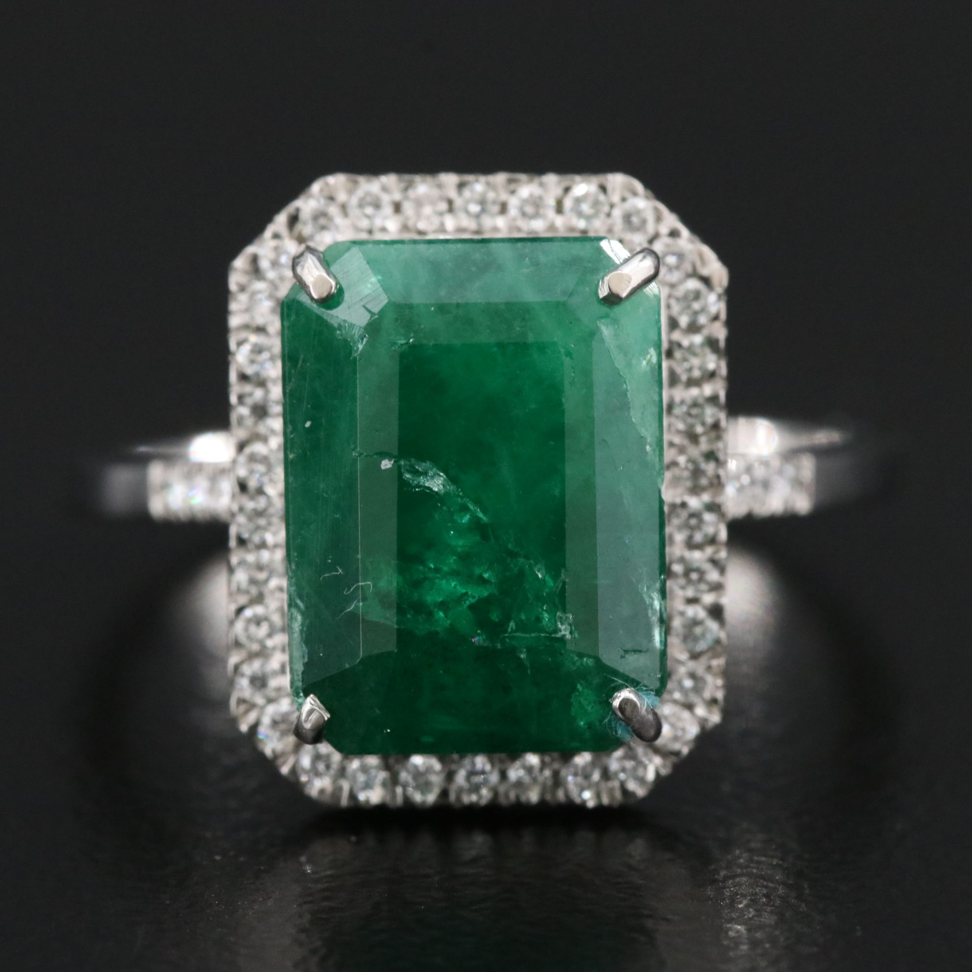 Platinum 6.51 CT Emerald and 0.20 CTW Diamond Ring