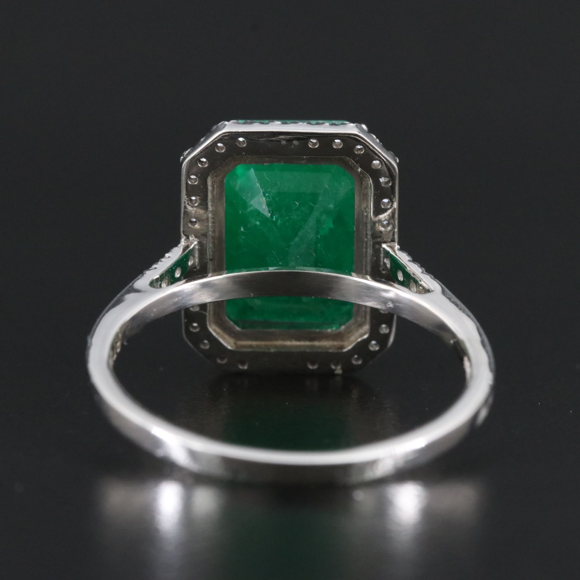 Platinum 6.51 CT Emerald and 0.20 CTW Diamond Ring
